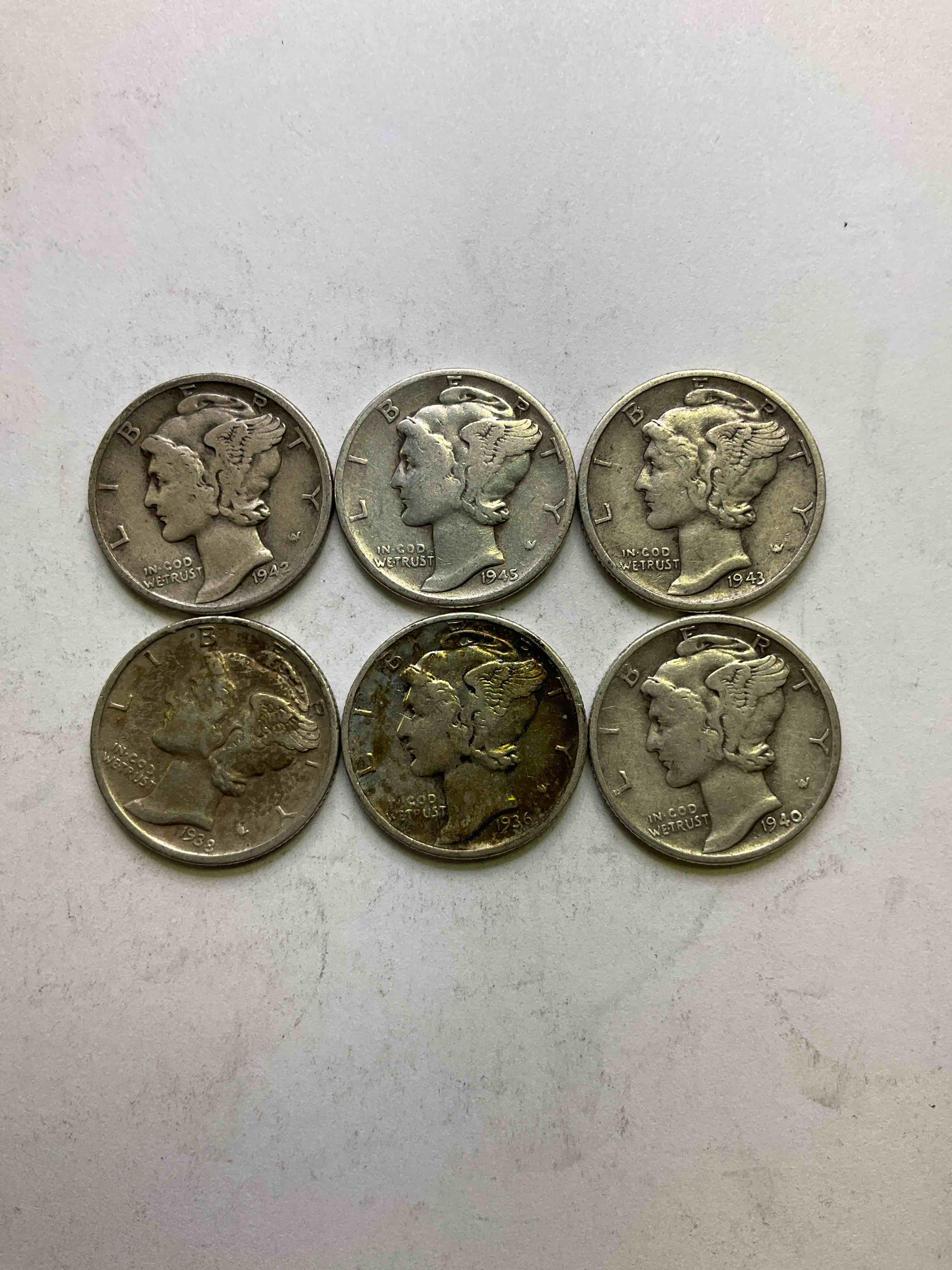 Antique U.S. Pure Fine Silver Mercury Dimes! Silver Mercury Dimes Were Minted From 1916-1945 & Have Become Serious Collector Items! Check Out These Awesome Examples, All In Nice, Circulated Condition With Visible Dates & Varying Years! Rare To Have Visible Dates! Makes For A Great Investment in Precious Metals, Mercury Dimes Are 90% Pure Fine Silver! They Don't Make Em' Like This Anymore!