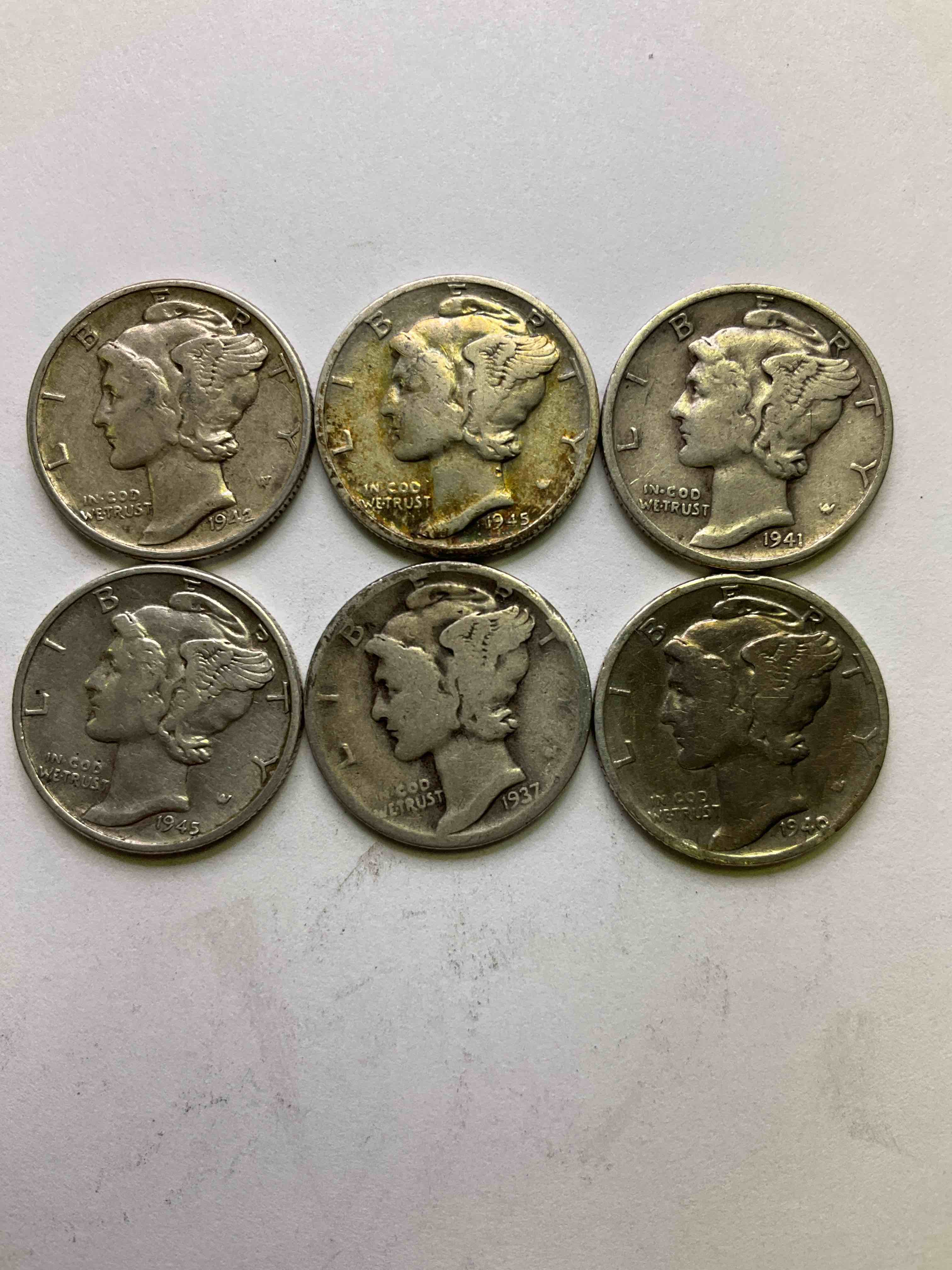 Antique U.S. Pure Fine Silver Mercury Dimes! Silver Mercury Dimes Were Minted From 1916-1945 & Have Become Serious Collector Items! Check Out These Awesome Examples, All In Nice, Circulated Condition With Visible Dates & Varying Years! Rare To Have Visible Dates! Makes For A Great Investment In Precious Metals, Mercury Dimes Are 90% Pure Fine Silver! They Don't Make Em' Like This Anymore!