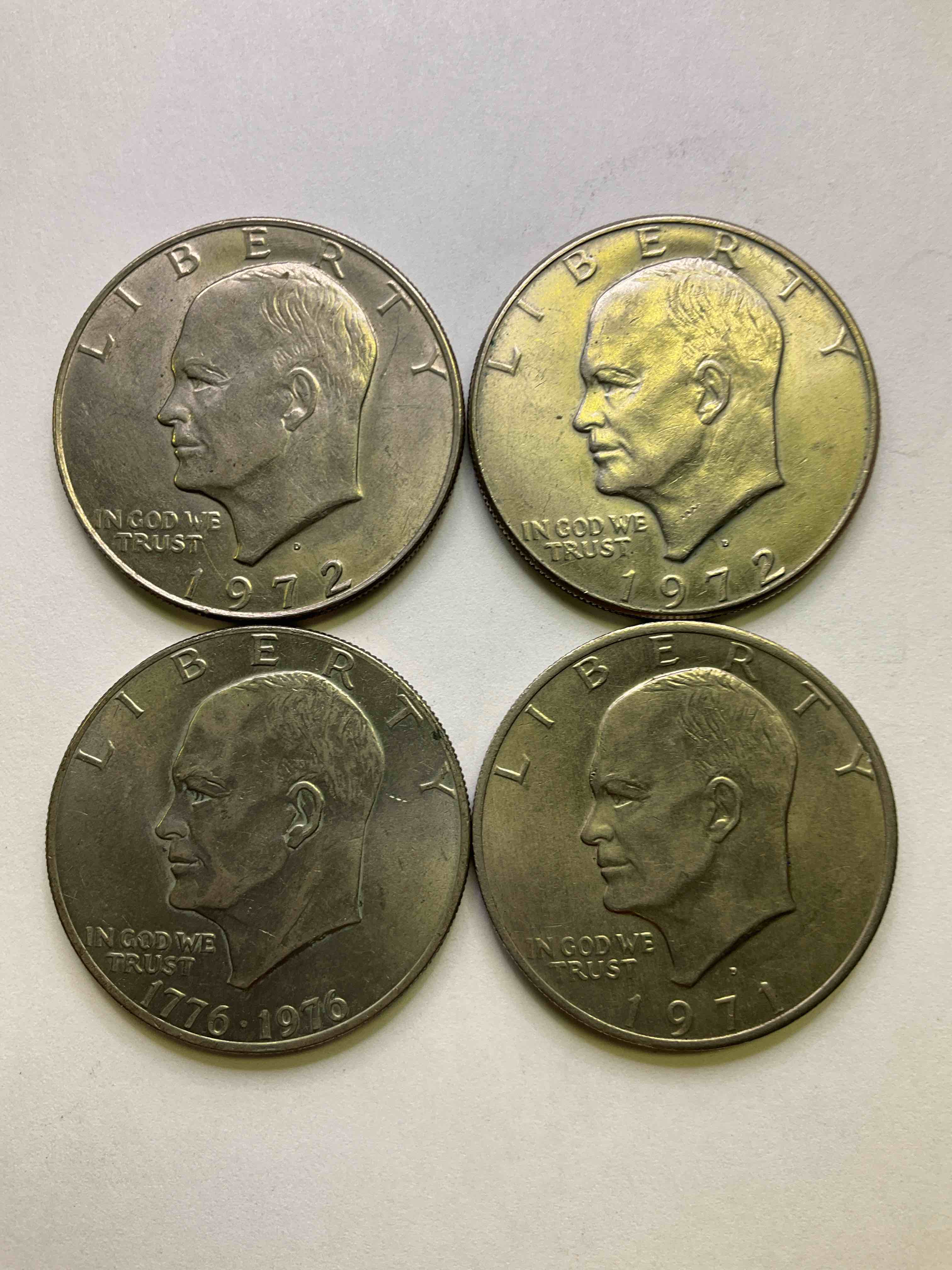 Eisenhower Dollar Coins, With A Bicentennial Coins! These Striking, Large U.S. Coins Were Minted From 1971-1978. Here Are Gorgeous Examples Of "Ike" Dollars In Varying Years. These Coins Have Become Immensely Popular With Collectors & Some Have Great Toning!