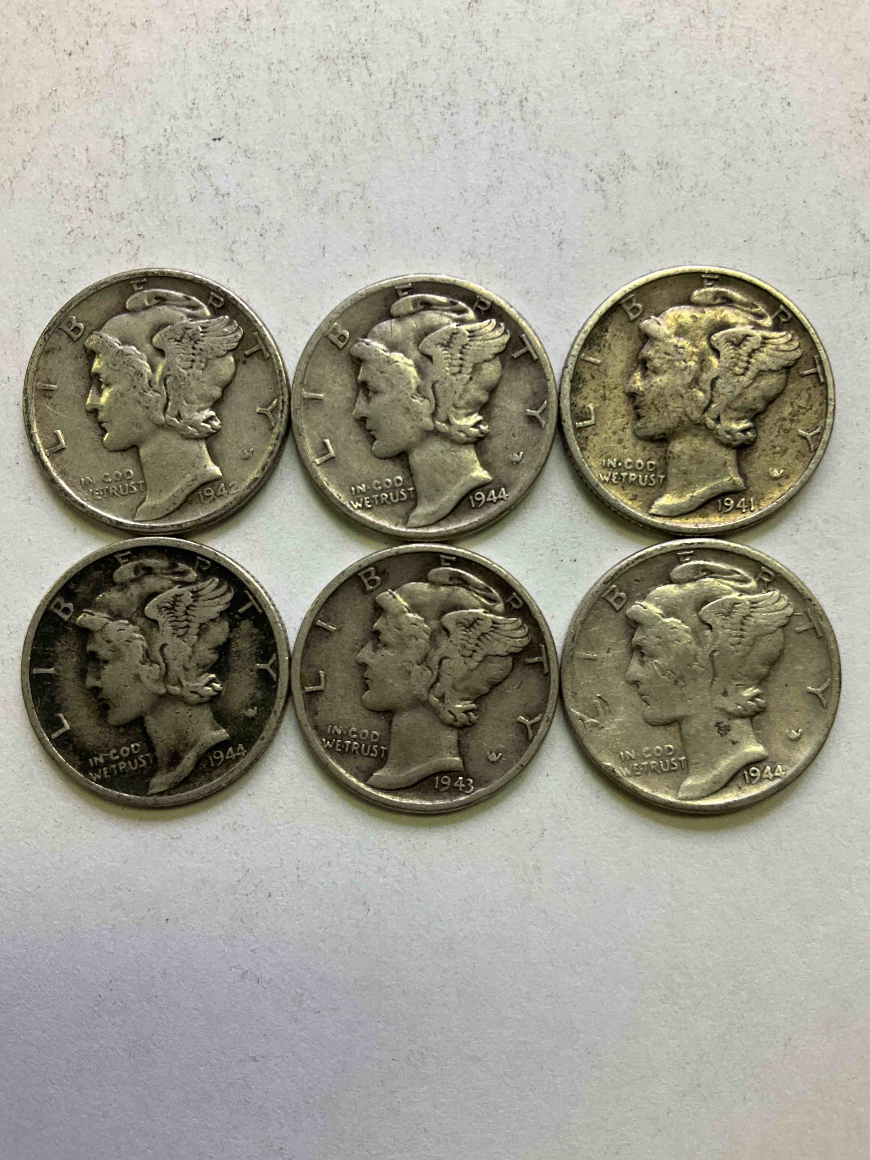 Antique U.S. Pure Fine Silver Mercury Dimes! Silver Mercury Dimes Were Minted From 1916-1945 & Have Become Serious Collector Items! Check Out These Awesome Examples, All In Nice, Circulated Condition With Visible Dates & Varying Years! Rare To Have Visible Dates! Makes For A Great Investment In Precious Metals, Mercury Dimes Are 90% Pure Fine Silver! They Don't Make Em' Like This Anymore!