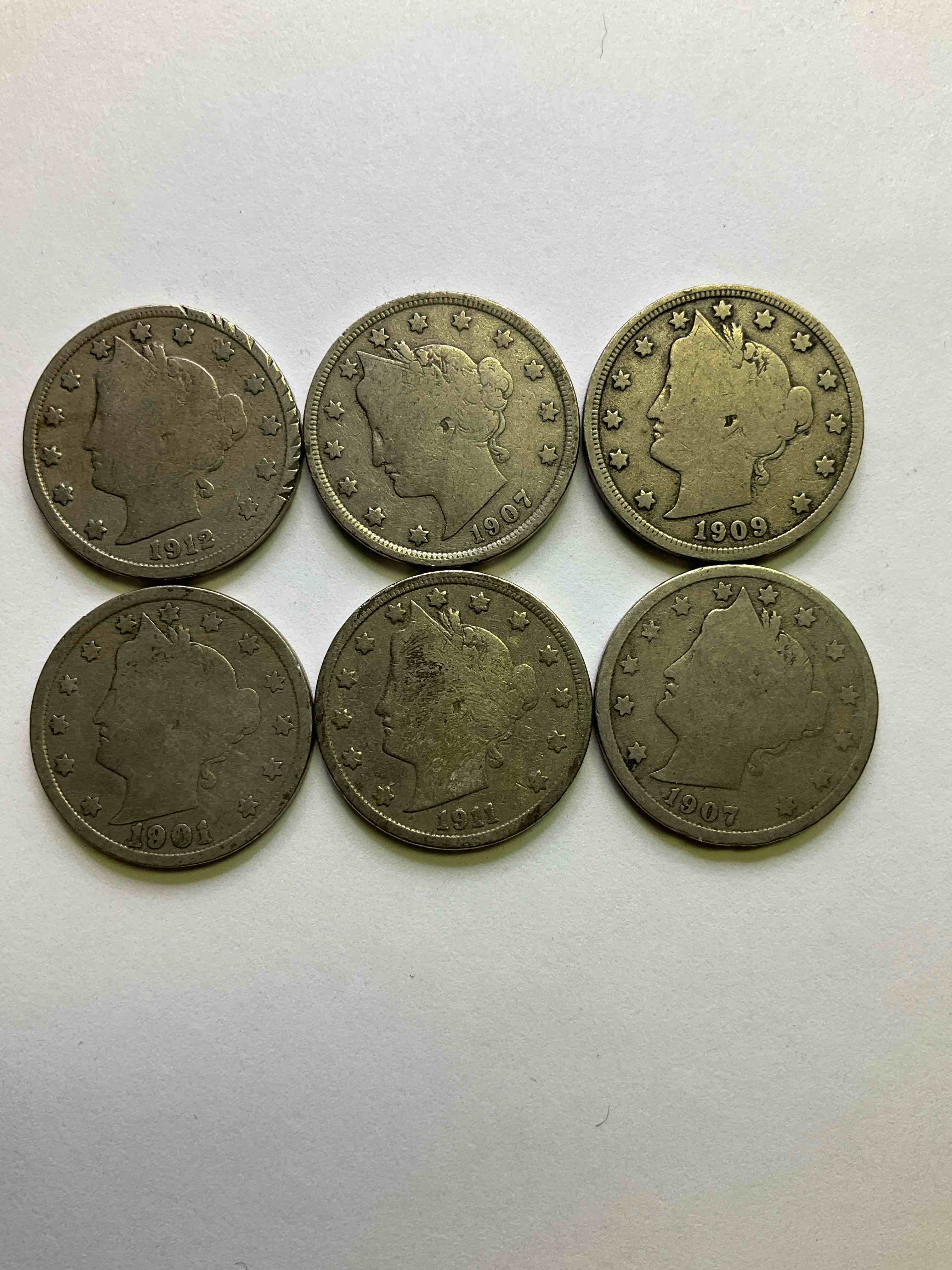 Antique U.S. "V" Nickels, 1912 Year Of The Titanic! Nearly Impossible To Collect!Antique V Nickels, Includes At Least One 1912, The Year Of The Sinking Of The Titanic! Own A Piece Of History Great For Coin Collectors, Think Of The History These Coins Have Seen!, Liberty Head V Nickels Were Minted Up Until 1913 & Were The Style Of Nickels Before Buffalo Nickels. Own Some Cool Pieces Of History! Rare To See These Coins With The "Date On" In Circulated Condition!