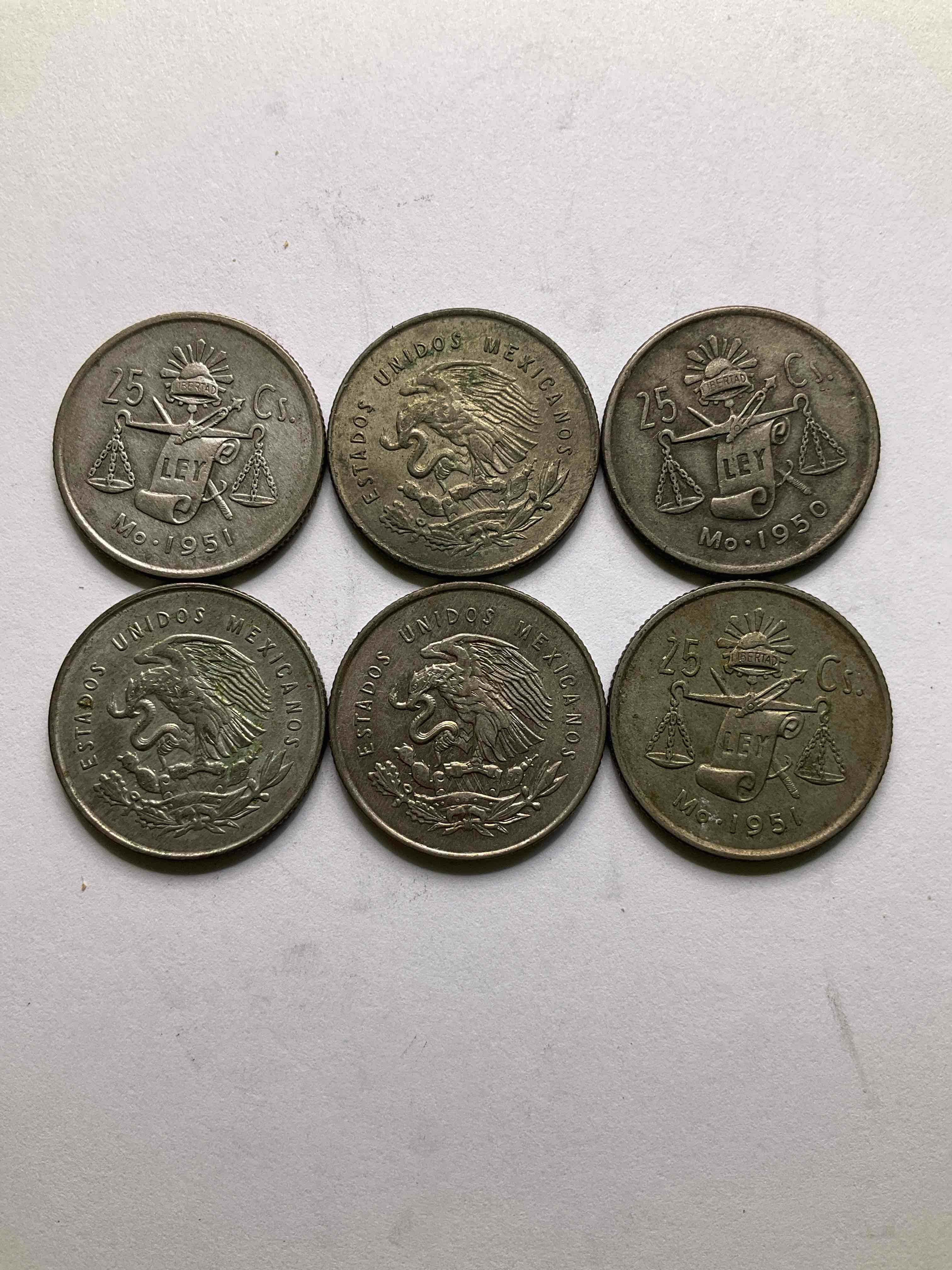 Antique Rare Mexican Silver! Lot Of Silver Antique Mexican Coins, 25 Centavos Minted In .300 (30%) Mexican Silver. Coins From The Early 1950's & Have A Really Stunning Design. These Coins Are Rarely Seen & Are Great For Collecting Rare Coins & Also For Investing In Precious Metals. You May Never See These Coins Up For Auction Again. A Great Chance To Acquire Unique Antique Mexican Silver!