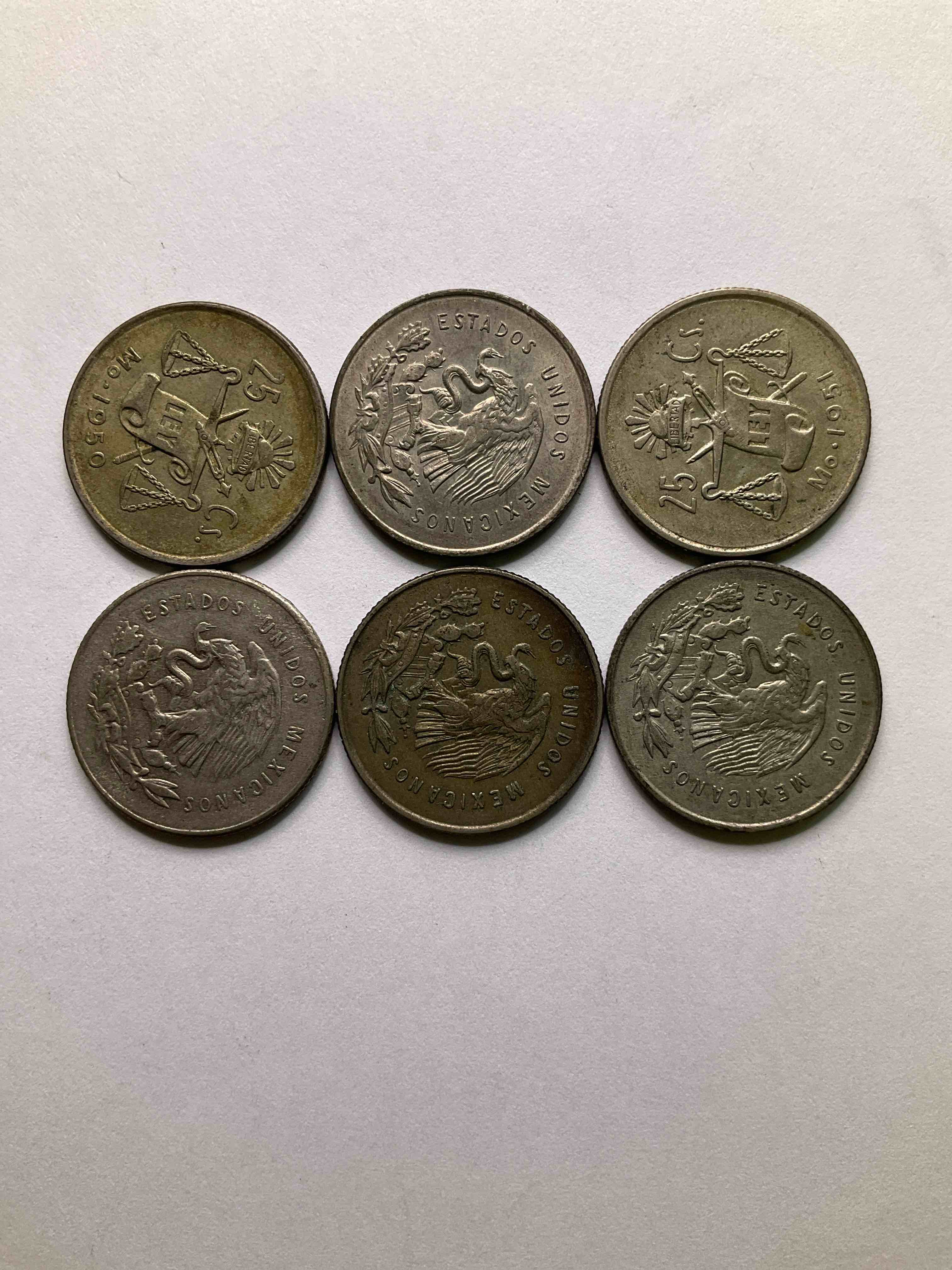 Antique Rare Mexican Silver! Lot Of Silver Antique Mexican Coins, 25 Centavos Minted In .300 (30%) Mexican Silver. Coins From The Early 1950's & Have A Really Stunning Design. These Coins Are Rarely Seen & Are Great For Collecting Rare Coins & Also For Investing In Precious Metals. You May Never See These Coins Up For Auction Again. A Great Chance To Acquire Unique Antique Mexican Silver!