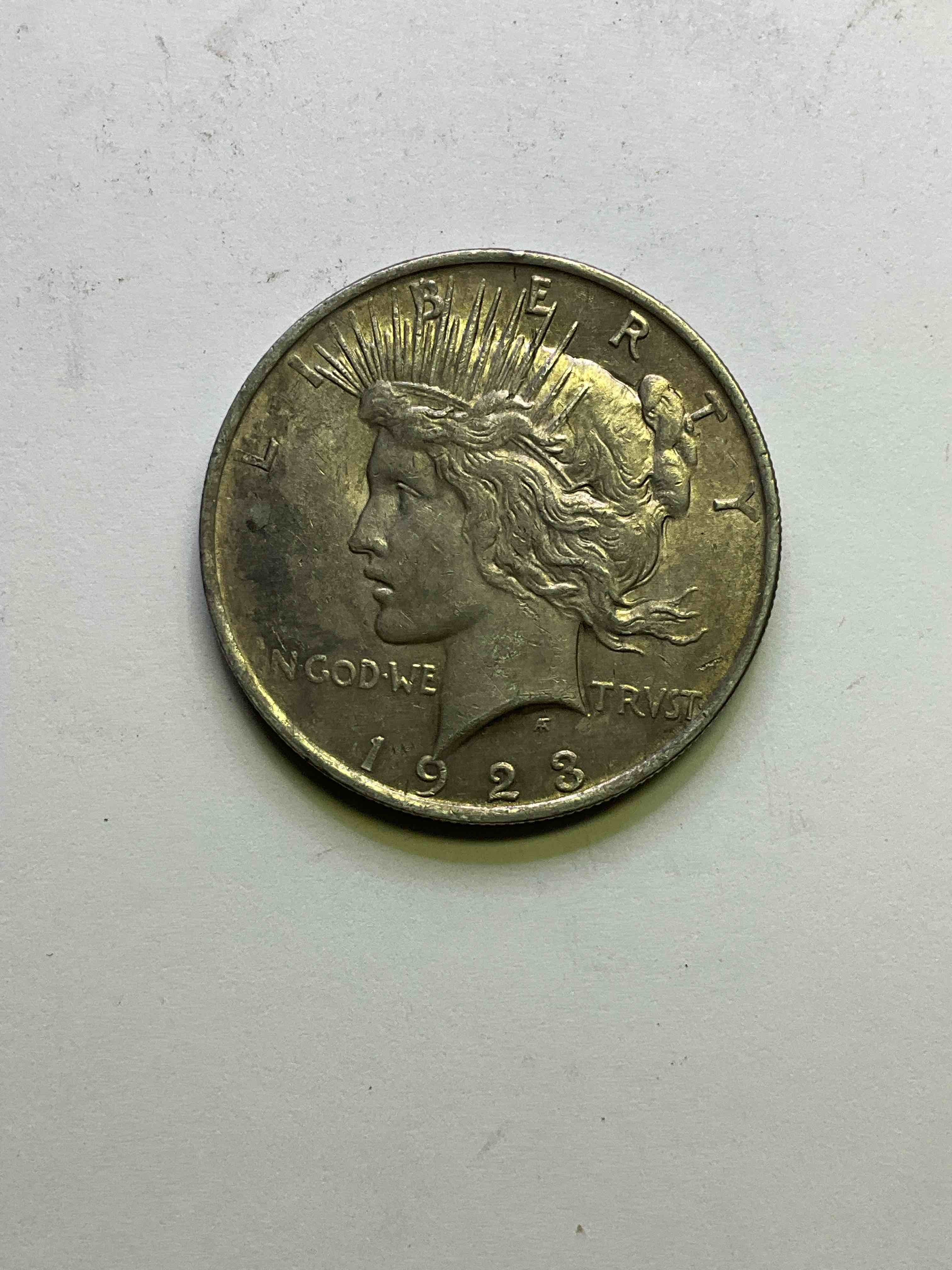 1923 Silver Peace Dollar U.S. Coin! Silver Peace Dollars Were Produced From 1921-1935 To Commemorate The End Of World War One. This Large, 1.5" Diameter, Heavy, Gorgeous Coin Is 90% Silver & 10% Copper, Giving It A Net Weight of .77344 oz. Of Pure Silver! Own A Valuable Piece Of History & An Incredible Investment In Precious Metals!