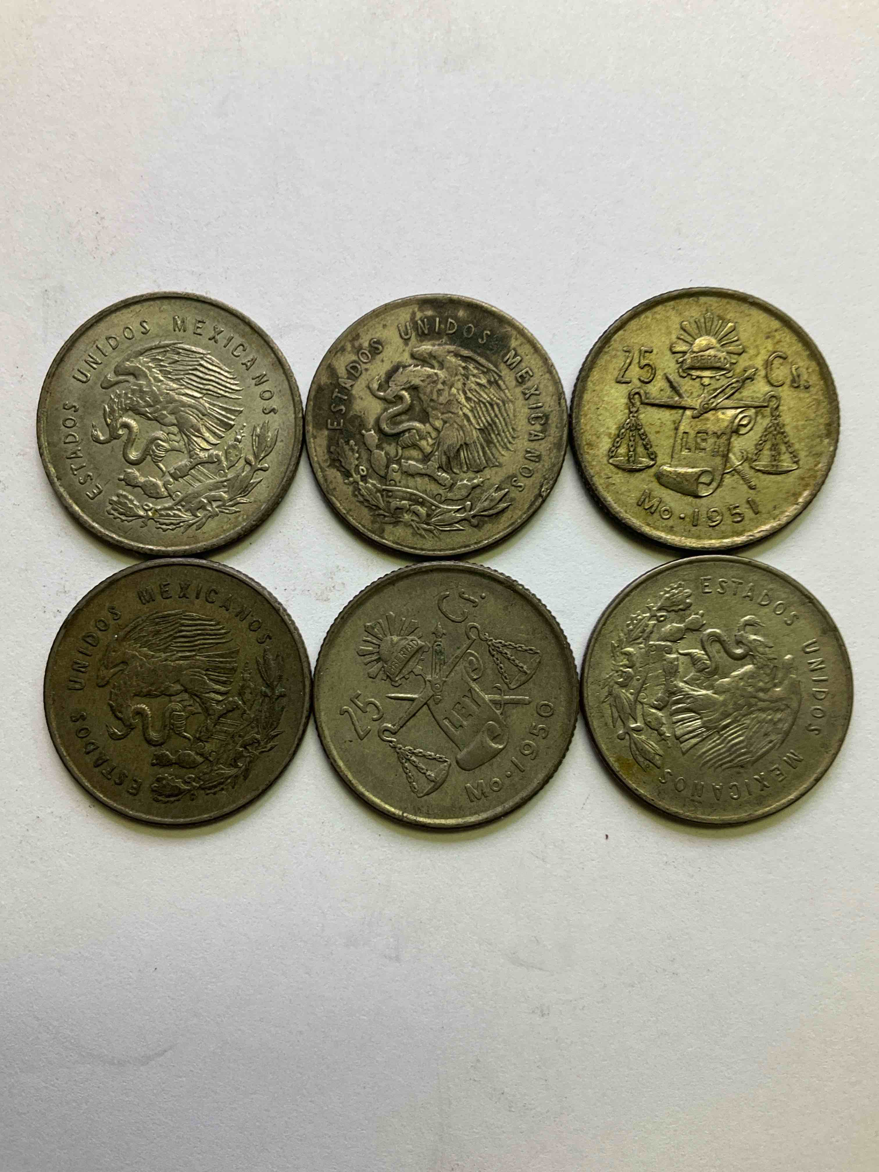 Antique Rare Mexican Silver! Lot Of Silver Antique Mexican Coins, 25 Centavos Minted In .300 (30%) Mexican Silver. Coins From The Early 1950's & Have A Really Stunning Design. These Coins Are Rarely Seen & Are Great For Collecting Rare Coins & Also For Investing In Precious Metals. You May Never See These Coins Up For Auction Again. A Great Chance To Acquire Unique Antique Mexican Silver!