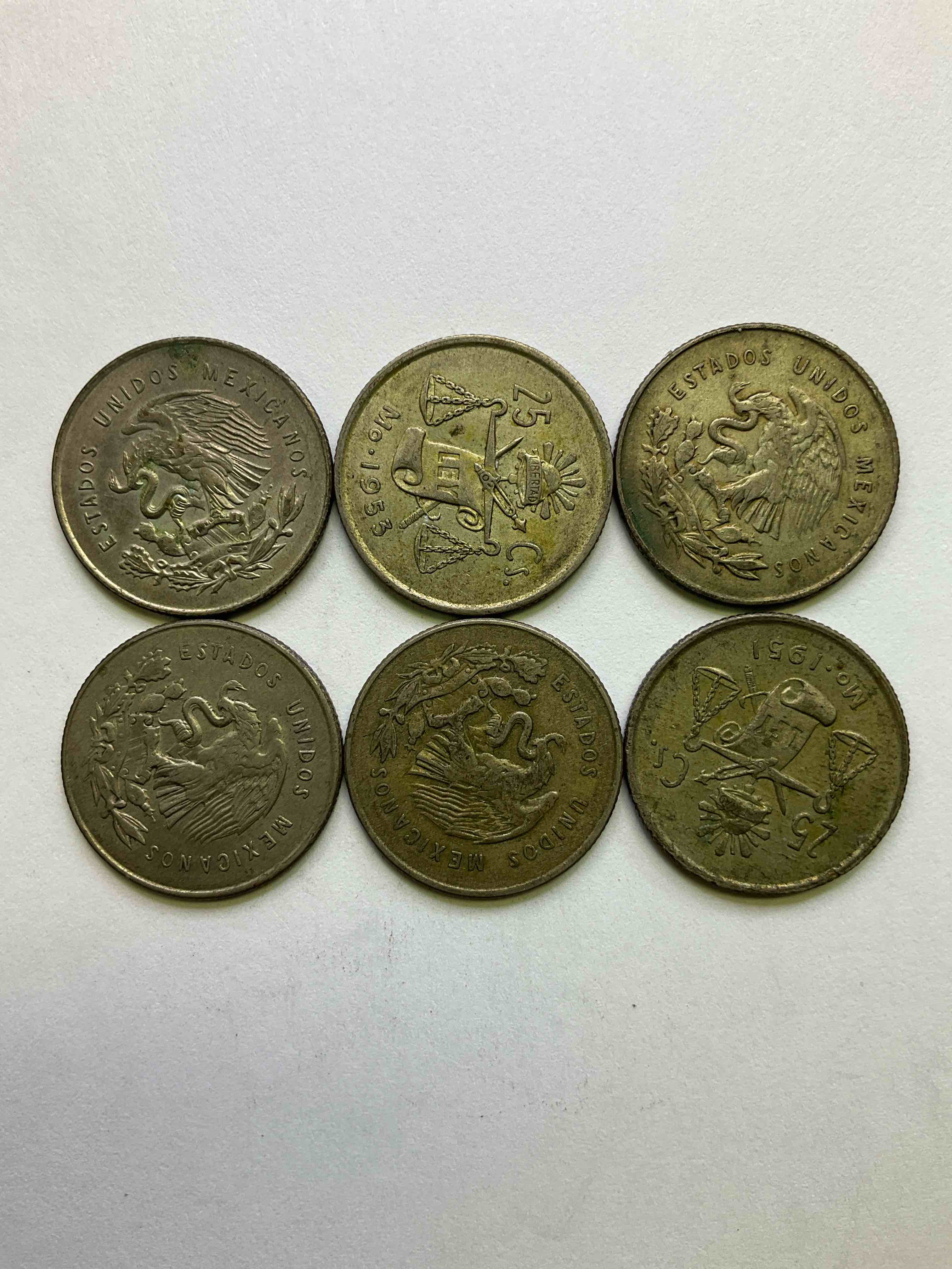 Antique Rare Mexican Silver! Lot Of Silver Antique Mexican Coins, 25 Centavos Minted In .300 (30%) Mexican Silver. Coins From The Early 1950's & Have A Really Stunning Design. These Coins Are Rarely Seen & Are Great For Collecting Rare Coins & Also For Investing In Precious Metals. You May Never See These Coins Up For Auction Again. A Great Chance To Acquire Unique Antique Mexican Silver!
