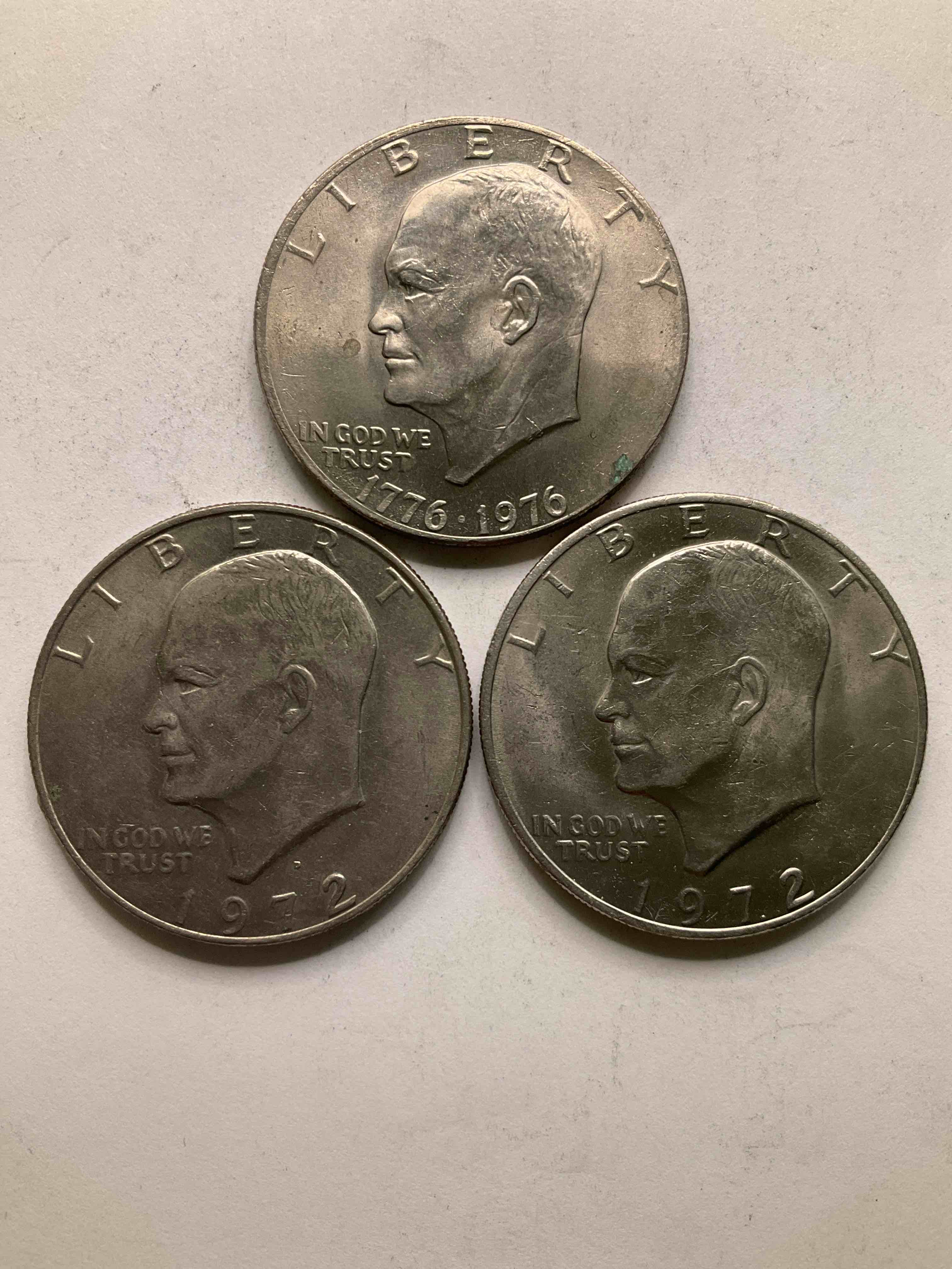 Eisenhower Dollars! Including 1976 Bicentennial Bliss! In 1976 The U.S. Mint Produced Coins Celebrating The 200 Year Anniversary Of America. Up For Auction Are Three Ike Dollars...  Including The Infamous Ike Dollar & 200 Year Anniversary Edition! Highly Desirable For Collectors! Own Pieces Of History & Get Ready For America's 250 Year Anniversary Coming Soon!