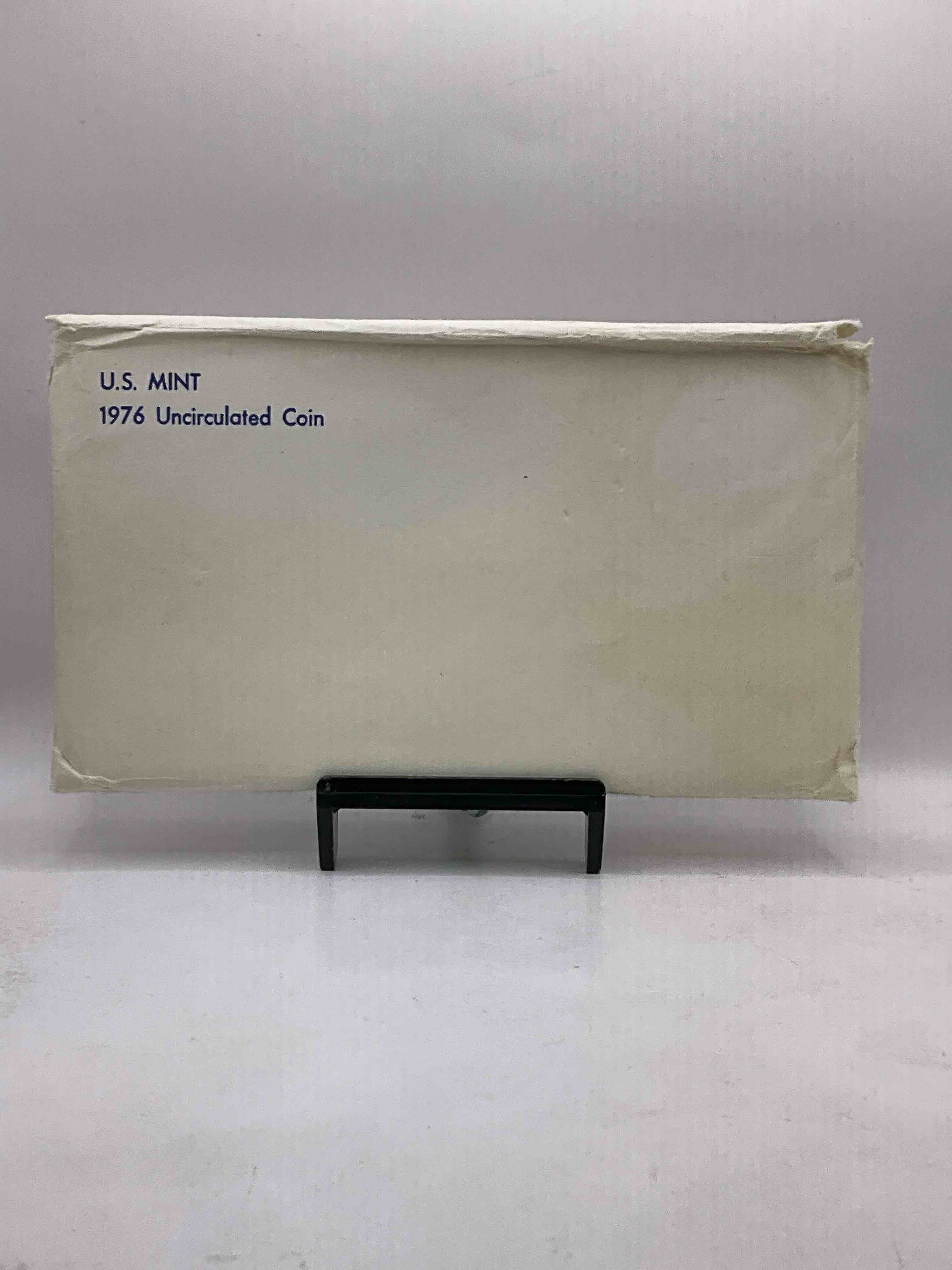 1976 Bicentennial Mint Set! This Highly Collectible Mint Set Includes 10 Coins, Five Minted From Each Mint Location (Philly & Denver) That Year. Coins Are 1976 Special Bicentennial Edition, To Include Rare Bicentennial "Ike" Dollar! Still In Its Original Envelope Direct From The U.S. Treasury in 1976!