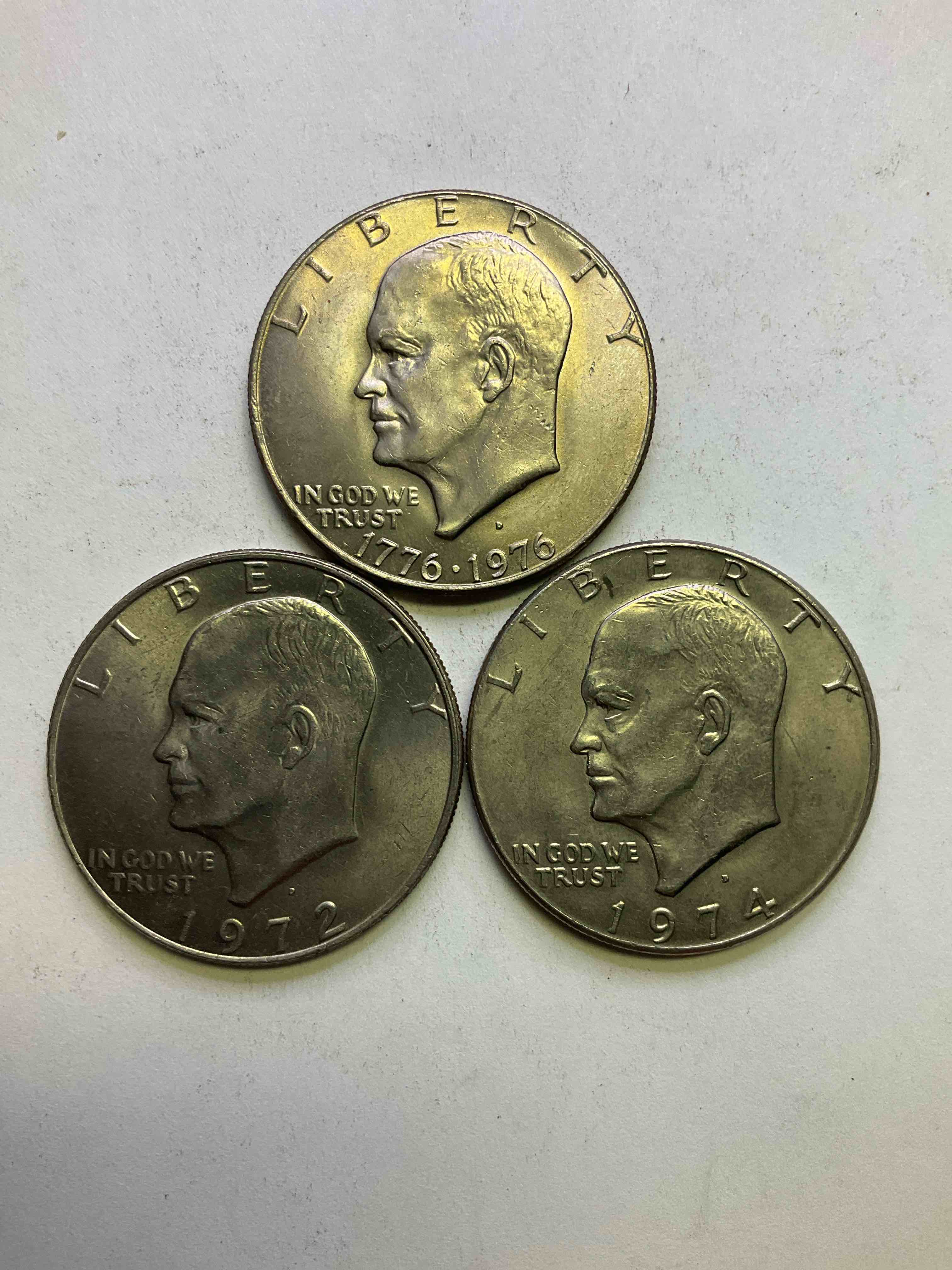Eisenhower Dollars! Including 1976 Bicentennial Bliss! In 1976 The U.S. Mint Produced Coins Celebrating The 200 Year Anniversary Of America. Up For Auction Are Three Ike Dollars...  Including The Infamous Ike Dollar & 200 Year Anniversary Edition! Highly Desirable For Collectors! Own Pieces Of History & Get Ready For America's 250 Year Anniversary Coming Soon!