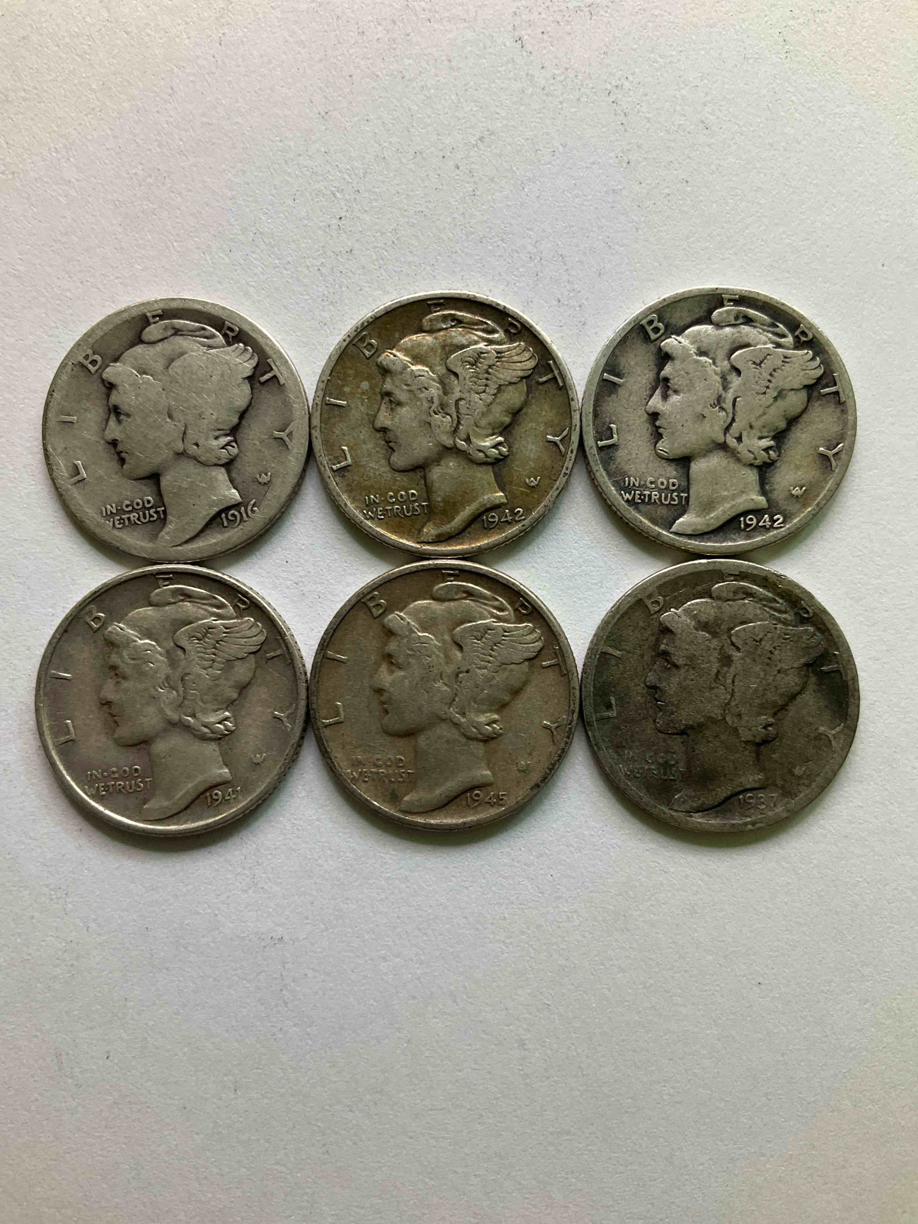 Antique U.S. Pure Fine Silver Mercury Dimes! Silver Mercury Dimes Were Minted From 1916-1945 & Have Become Serious Collector Items! Check Out These Awesome Examples, All In Nice, Circulated Condition With Visible Dates & Varying Years! Rare To Have Visible Dates! Makes For A Great Investment In Precious Metals, Mercury Dimes Are 90% Pure Fine Silver! They Don't Make Em' Like This Anymore!