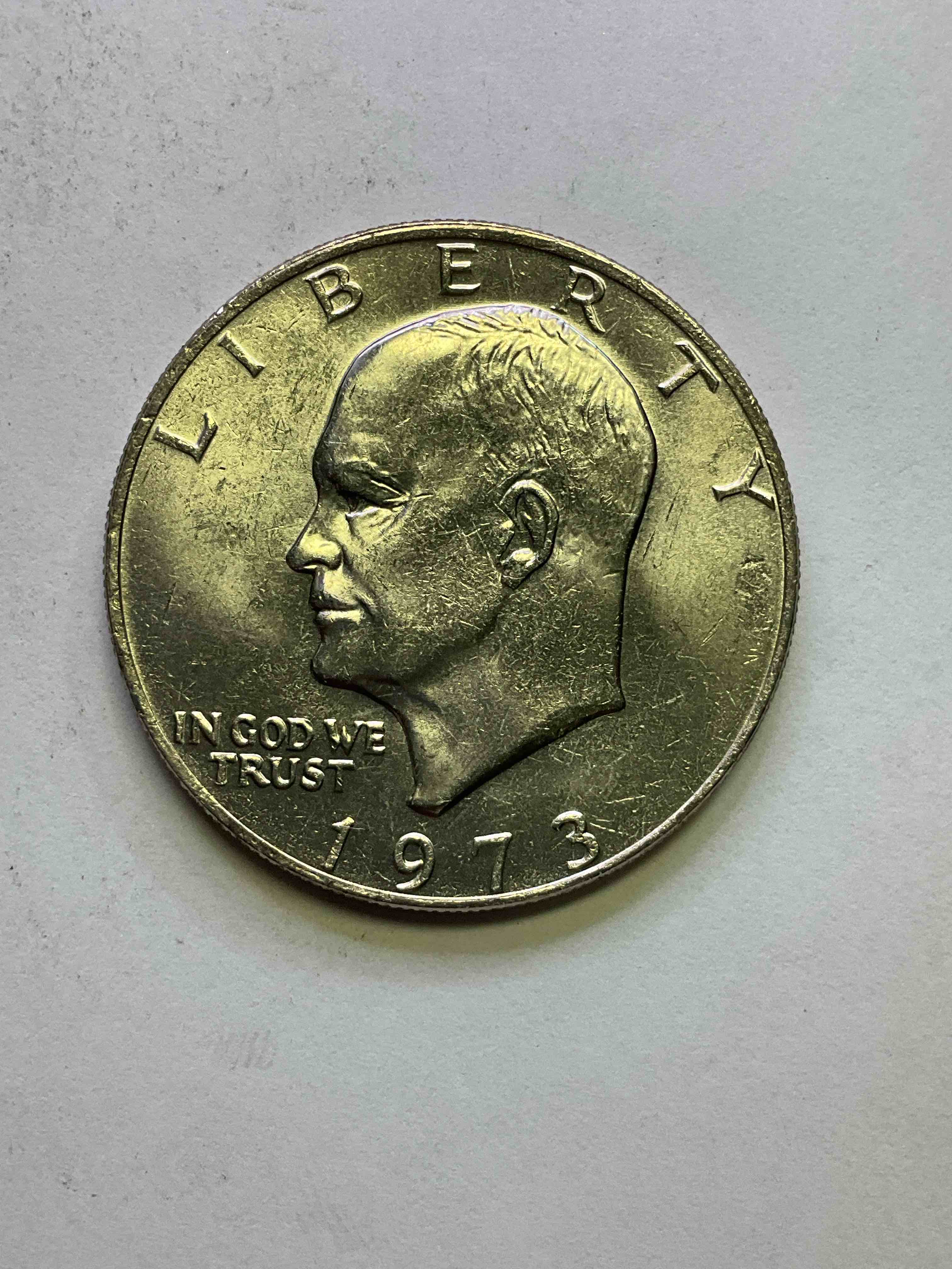 Brilliant Uncirculated Eisenhower Dollar Coin! These Striking, Large U.S. Coins Were Minted From 1971-1978. Here Is A Gorgeous Example Of An "Ike" Dollar From 1973. These Coins Have Become Immensely Popular With Collectors & Some Have Great Toning!