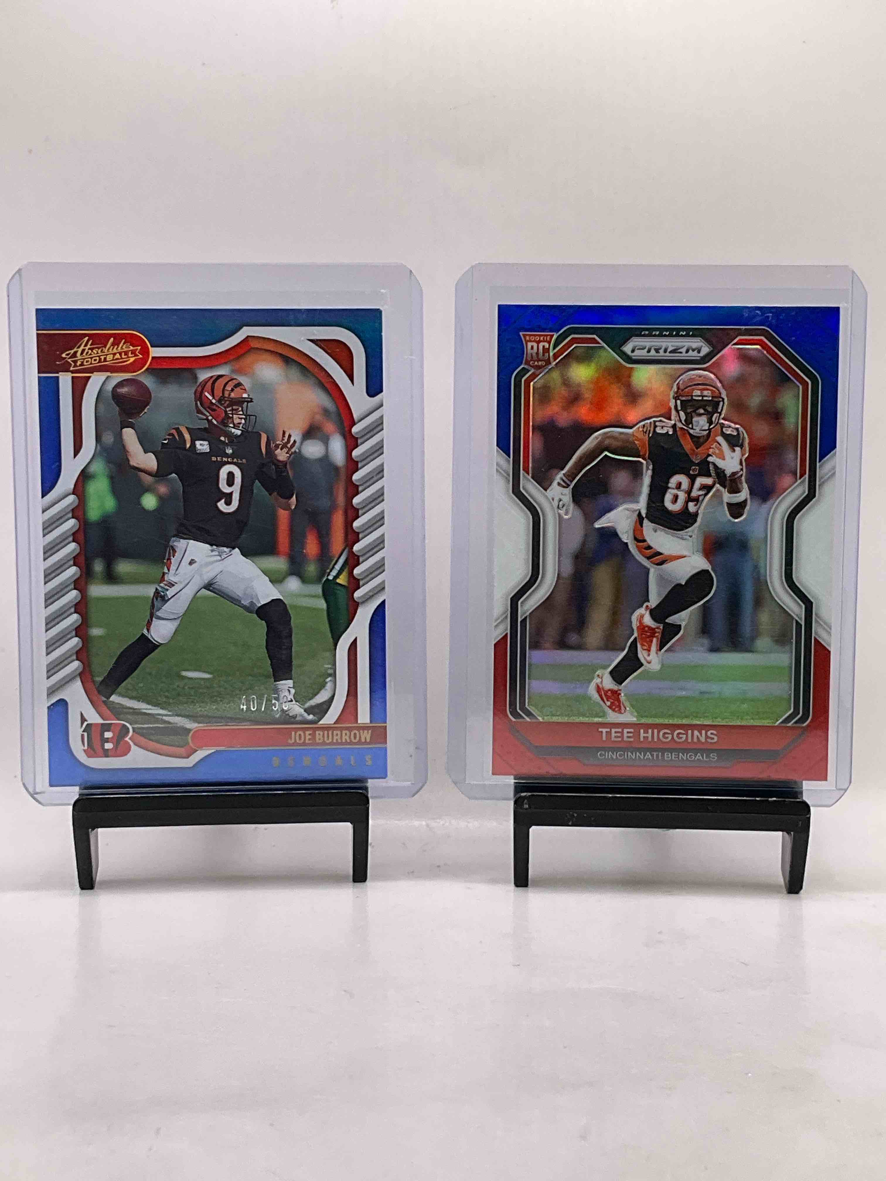 Joe Burrow & Tee Higgins Red White & Blue! Joe Burrow Absolute 40/50 Card, Tee Higgins Red White & Blue Prizm Rookie, Tee Higgins Mosaic Rookie, Ja’marr Chase Prizm Rookie, Boomer Esiason, Orange Lasers, Joe Burrow Rookie & So Much More! Vintage & New! 