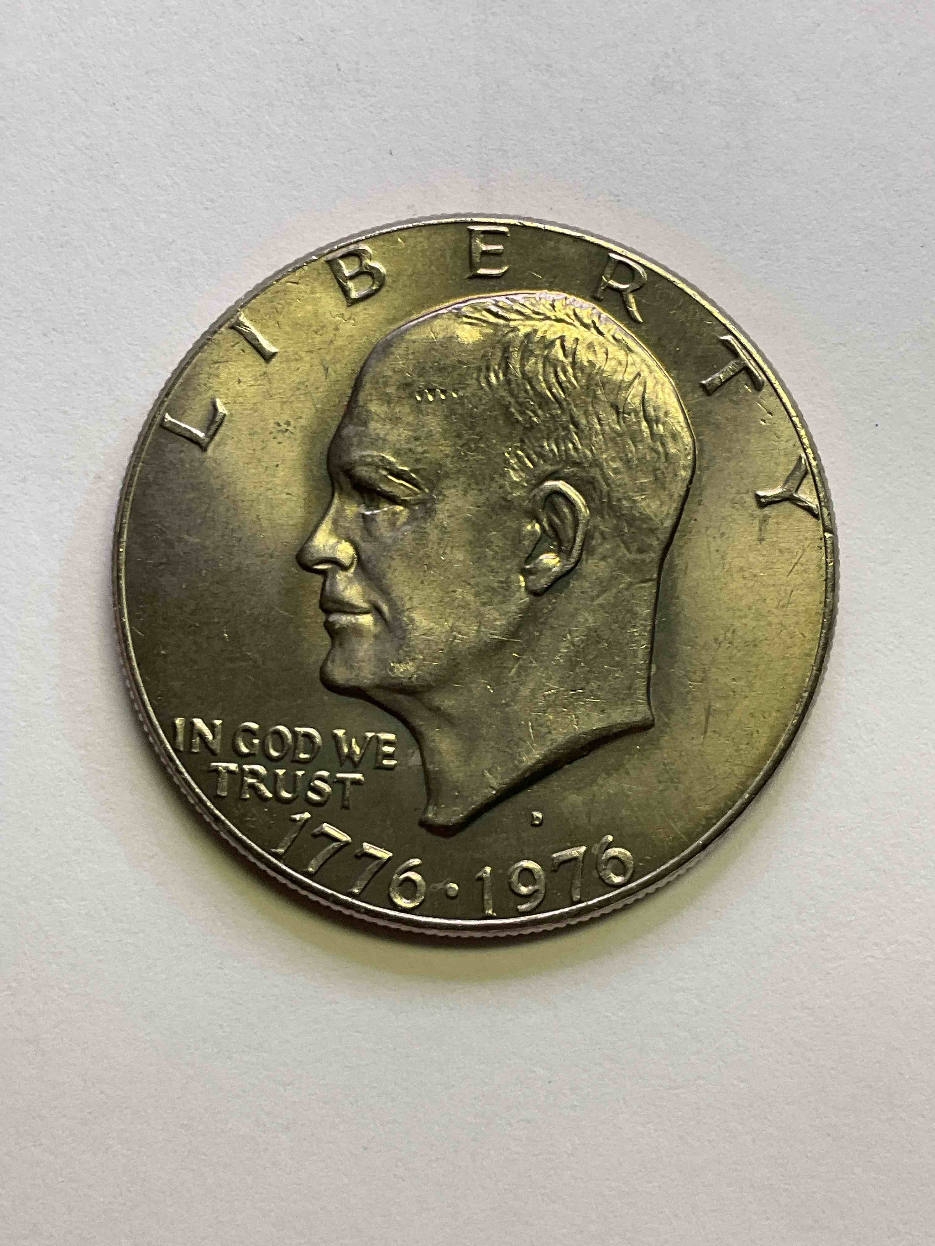 Brilliant Uncirculated Bicentennial Eisenhower Dollar Coin! These Striking, Large U.S. Coins Were Minted From 1971-1978. Here Is A Gorgeous Example Of An "Ike" Dollar From 1976. These Coins Have Become Immensely Popular With Collectors & Some Have Great Toning!