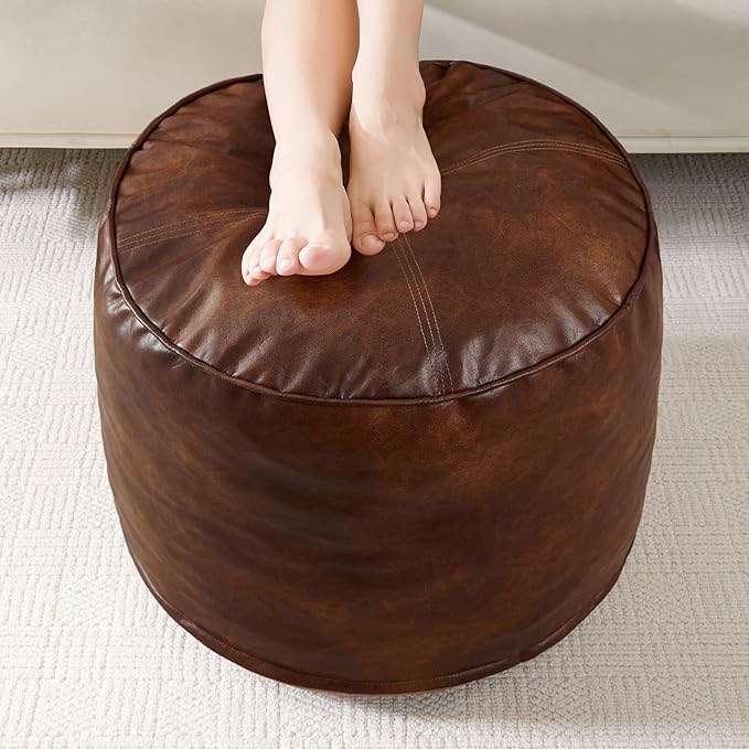 HIGOGOGO Round Stuffed Pouf Ottoman, Pu Leather Poufs with Foam Chunk Filling, Furry and Fluffy Pouf Foot Stool Storage Ottoman, 26 X 18 Floor Poufs Foot Rest for Living Room,Dark Brown