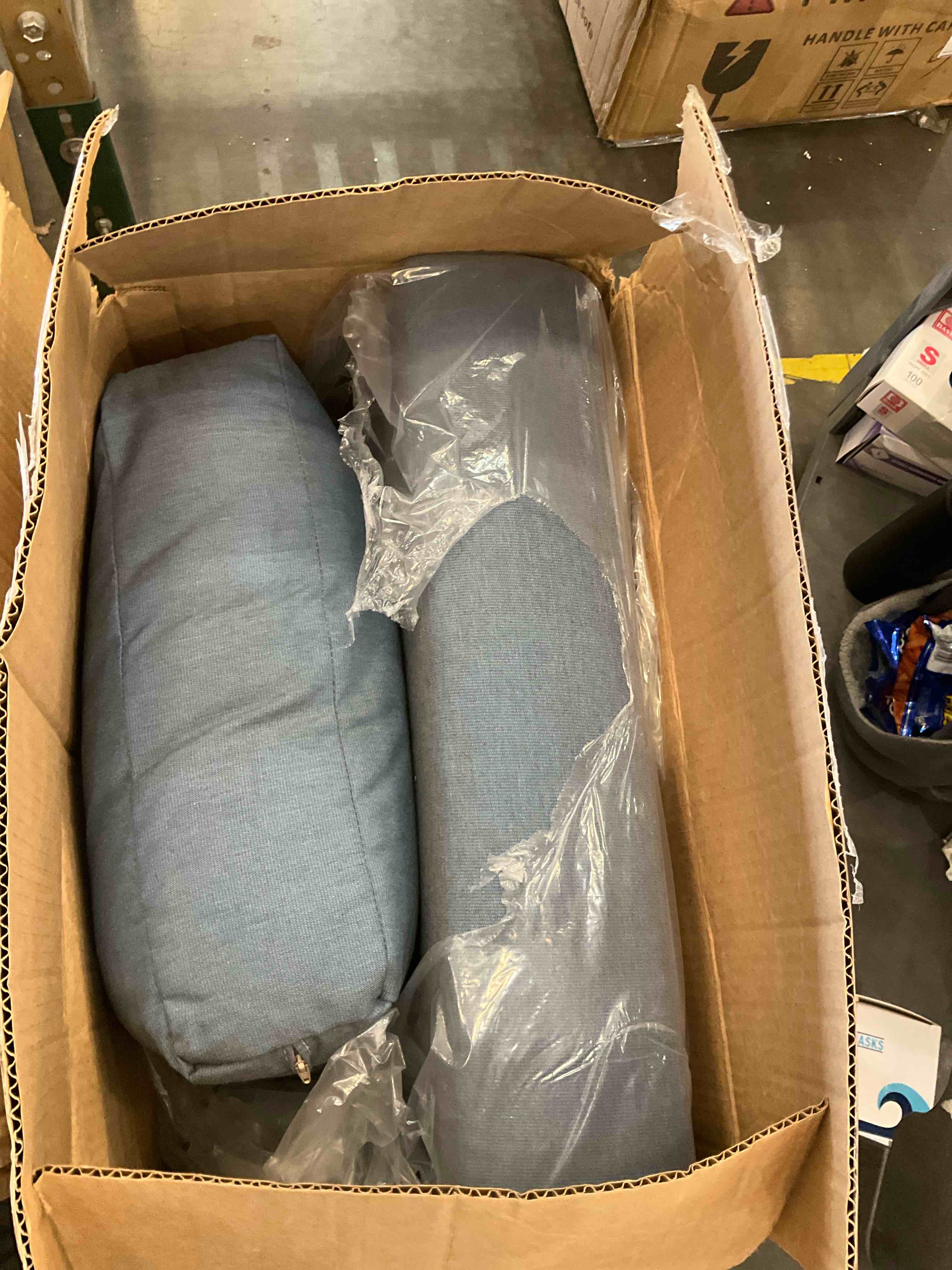 3 boxes of couch cushions