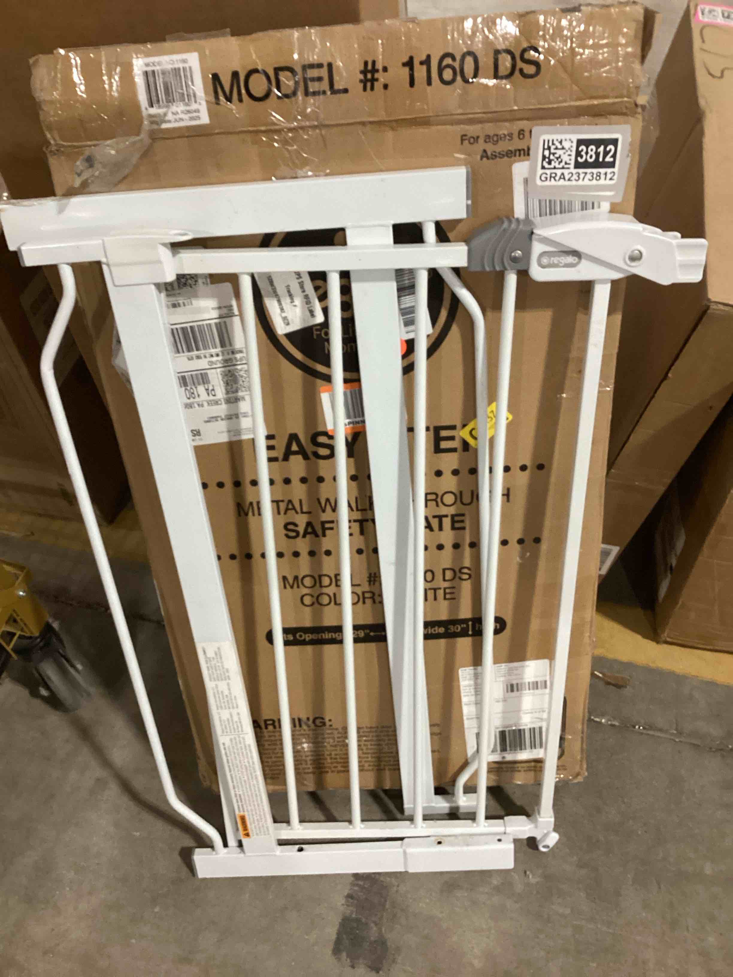 Condition photo showing As Is for Regalo Safety 38" Baby Gate for Doorways & Bottom of Stairs, Pressure Mount Design for Babies, Toddlers & Pets, Tested & Safe for 30 Years, American Designed, American Owned, White White 29-38.5"W x 30"H