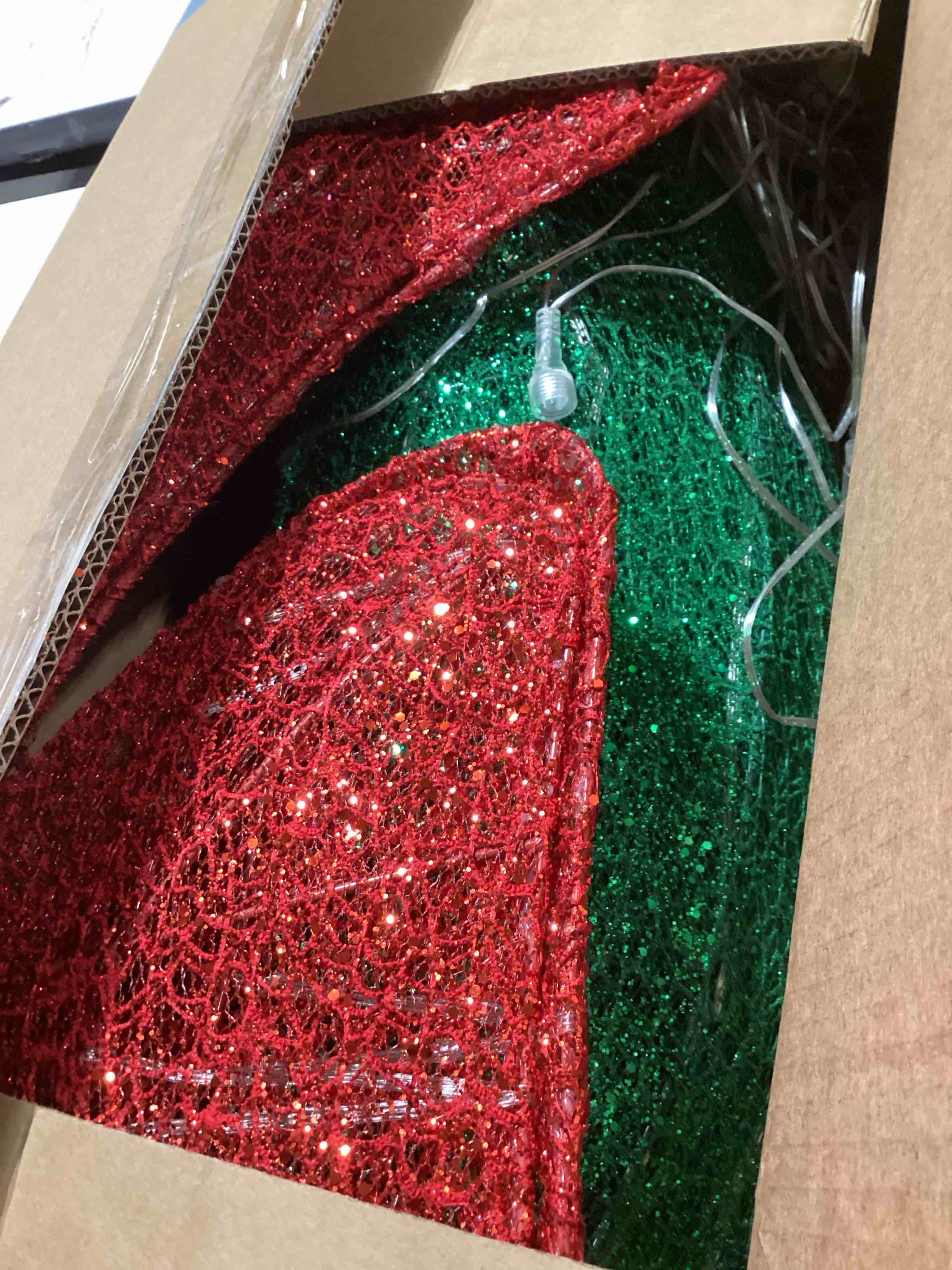 Condition photo showing As Is for Sweetcrispy 48in Pre-Lit Christmas Wreath, LED Lighted Holiday Outdoor Decoration with Bow for Door,