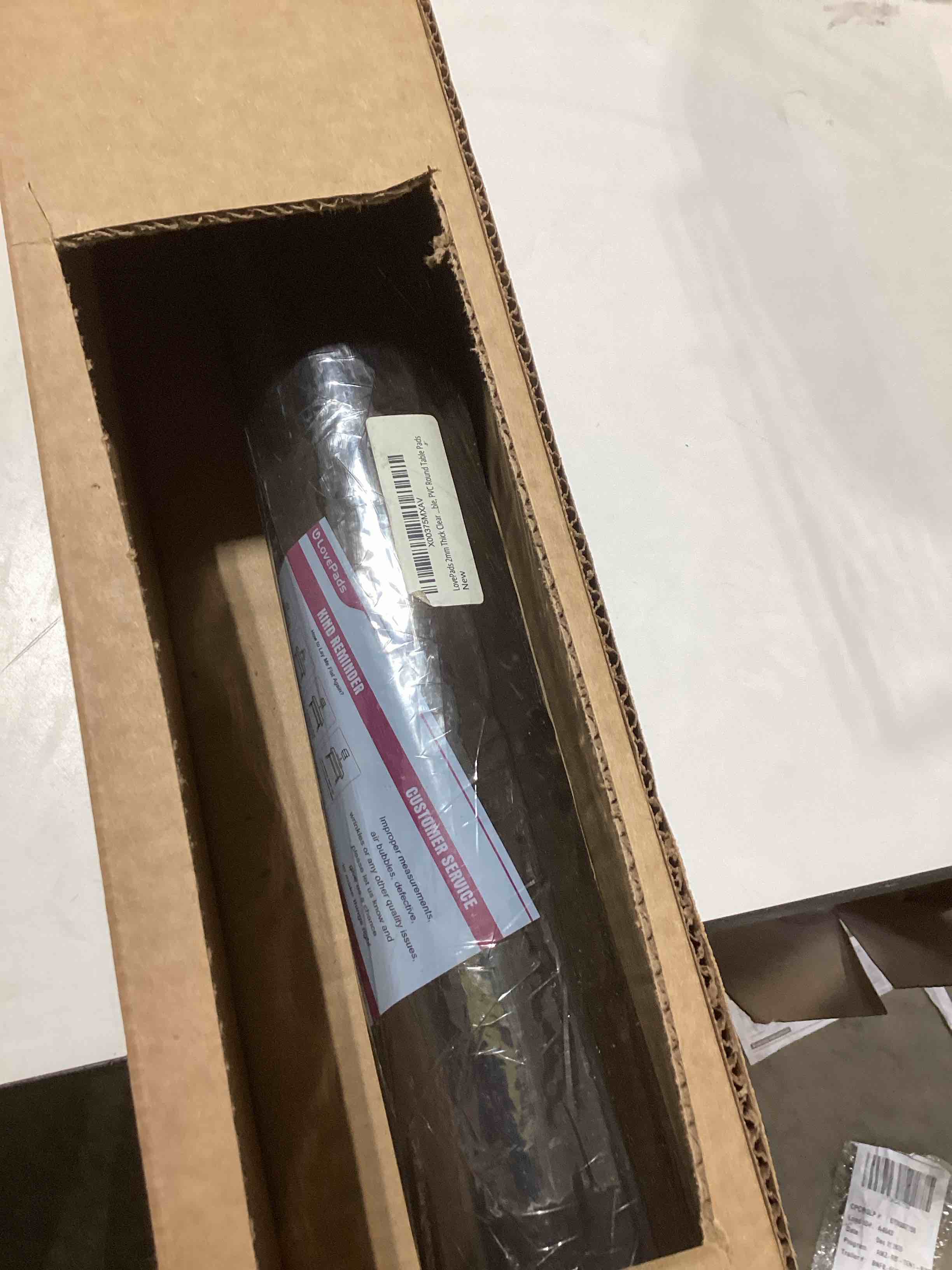 Condition photo showing As Is for LovePads 2mm Thick Clear Round Table Cover Protector 54 Inch Clear Round Table Protector for Dining 