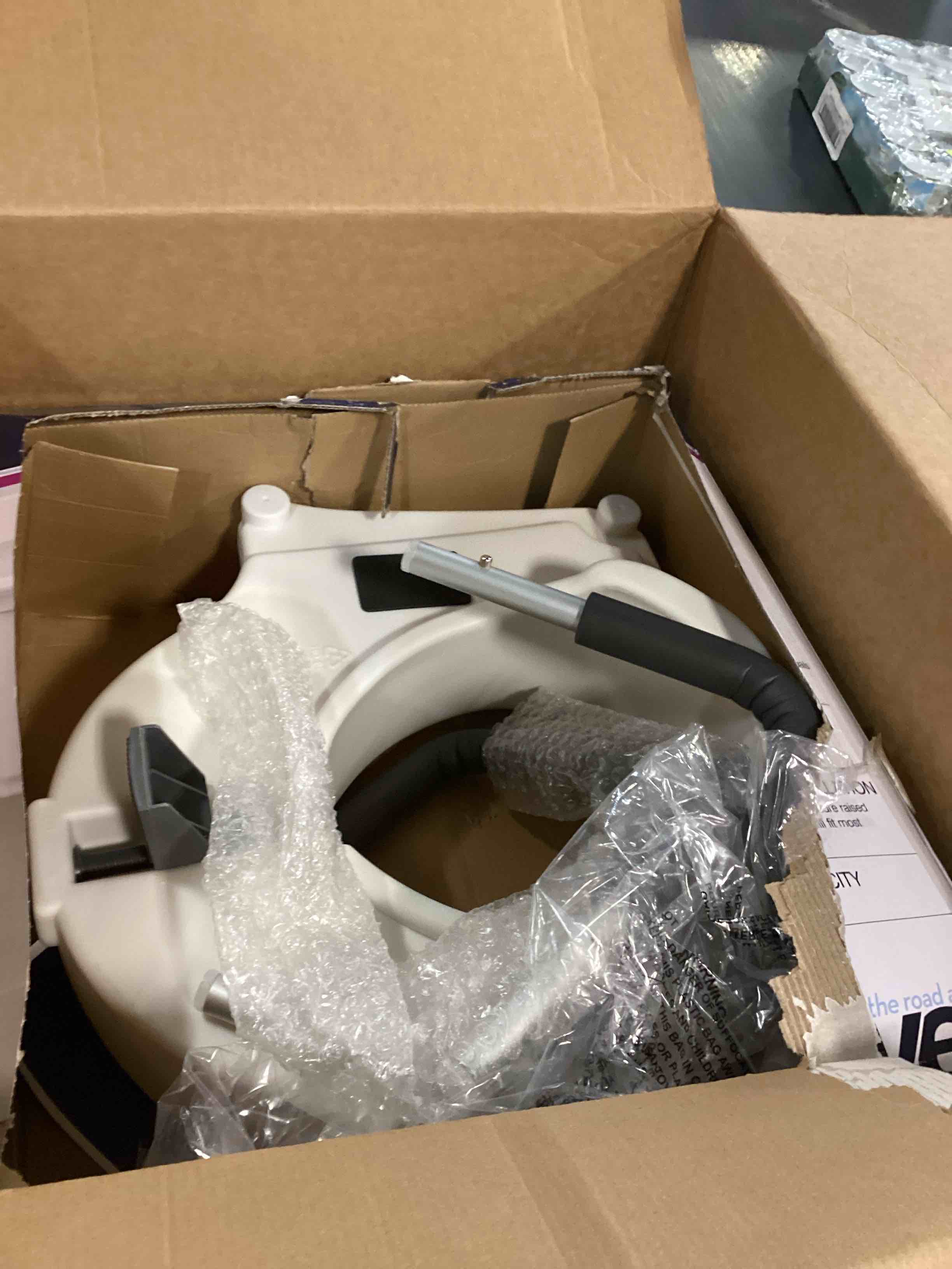 Condition photo showing As Is for Drive Medical 2-in-1 Raised Toilet Seat with Removable Padded Arms - Elevated Bathroom Safety Support - Secure Locking Attachment - Easy Height Assistance - Durable Plastic Construction Standard