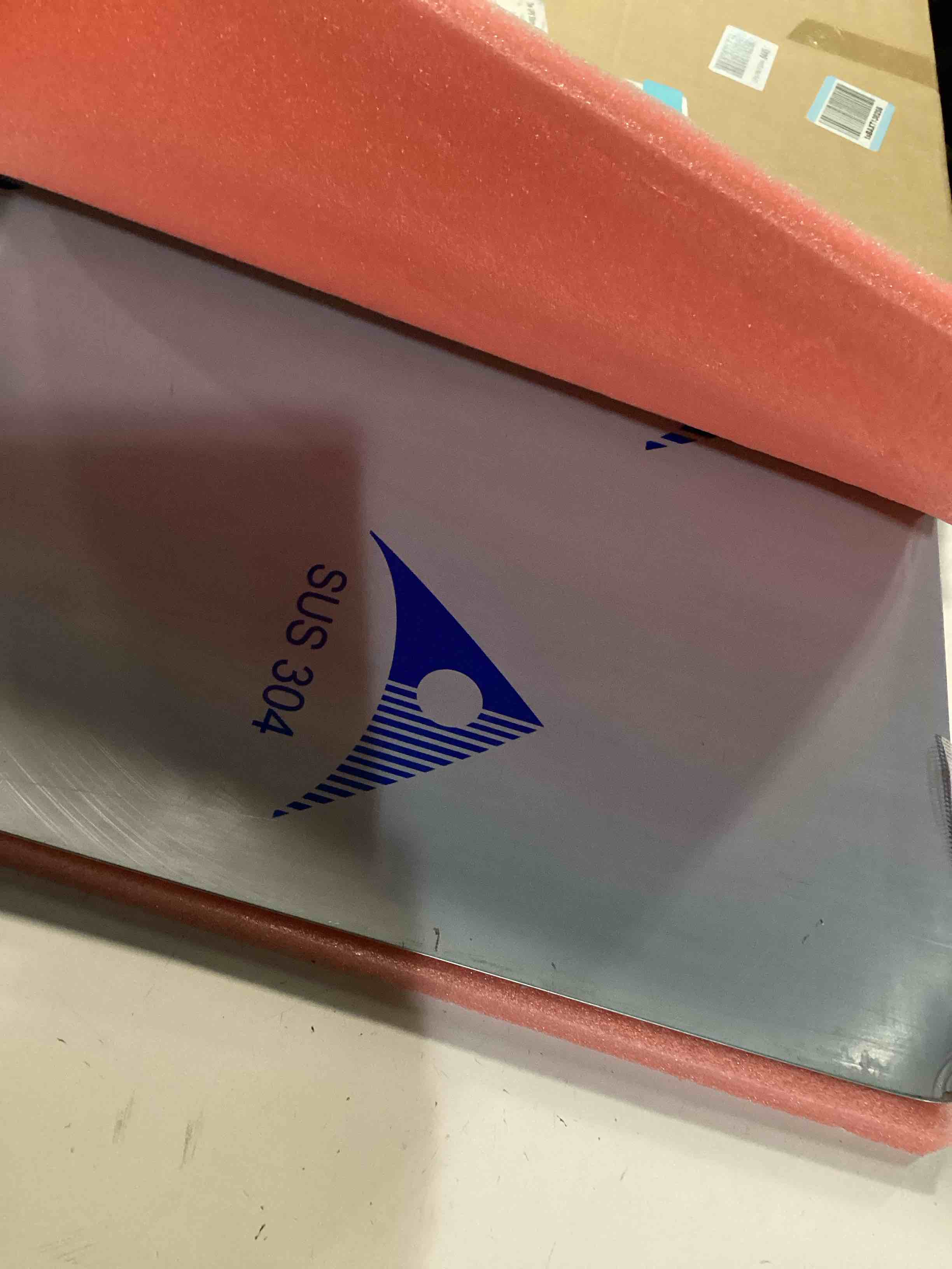 Condition photo showing As Is for Stainless Steel Cutting Boards for Kitchen,304 Stainless Steel Chopping Boards with Lip and Non-slip silicone pad for Countertop Cutting Meats Fruits,Easy To Clean(19.6 * 23.6 * 0.06inch) 19.6"L x 23.6"W