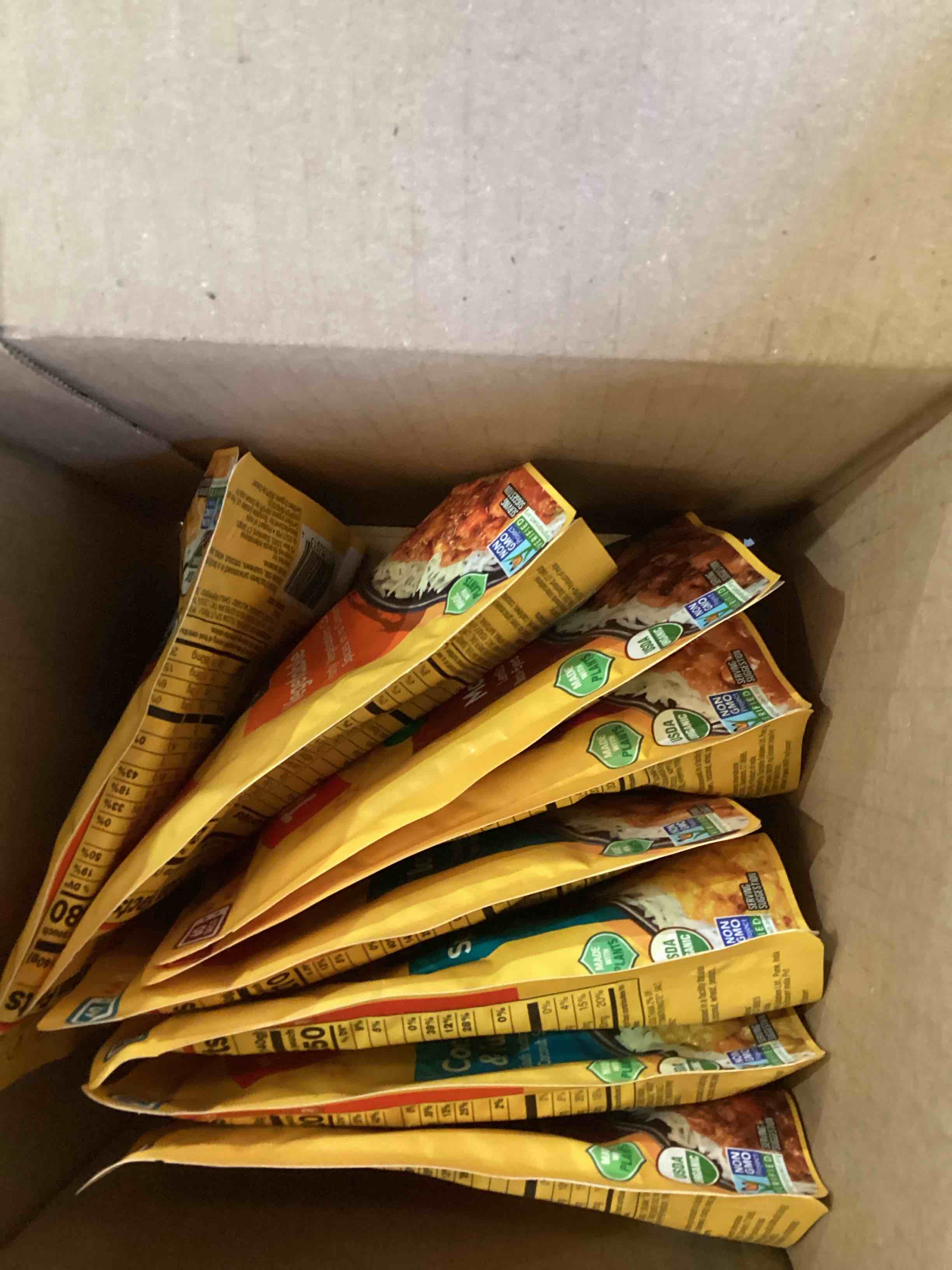 Condition photo showing As Is for Tasty Bite Variety, Pack of 8, Madras Lentils, Bombay Potatoes, Vegetable Tikka Masala, Channa Masala, 3Bean Madras Lentils, Split Pea & Turmeric Curry, Coconut Squash Dal, Chickpea Coconut and Turmeric Curry