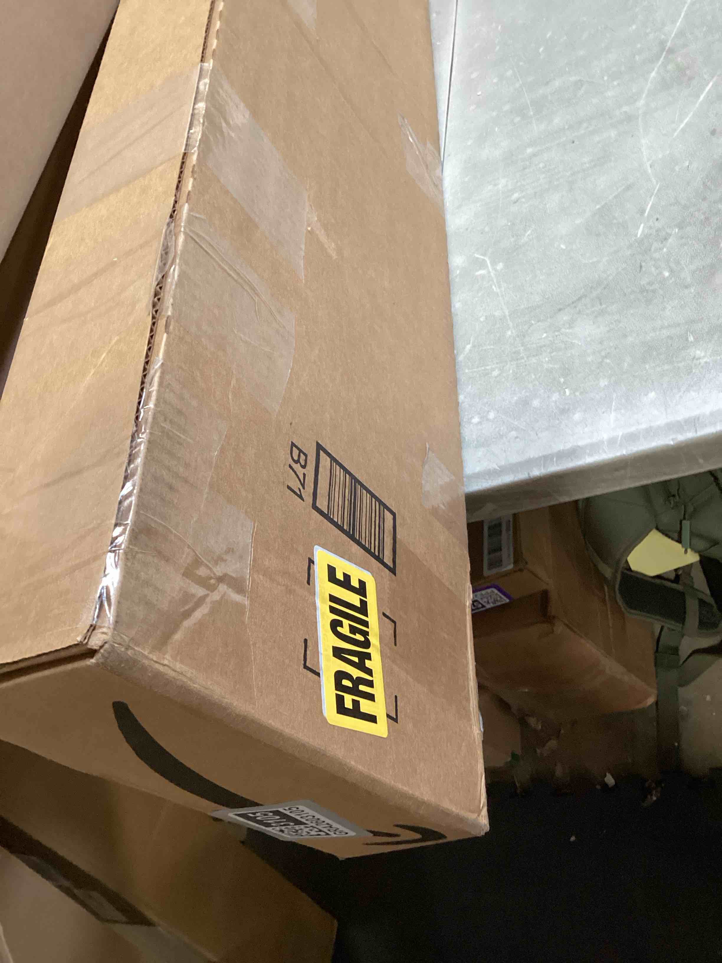 https://s3.amazonaws.com/lotting-images-prod/bidfta/GRA2603105_1755014820264.jpeg