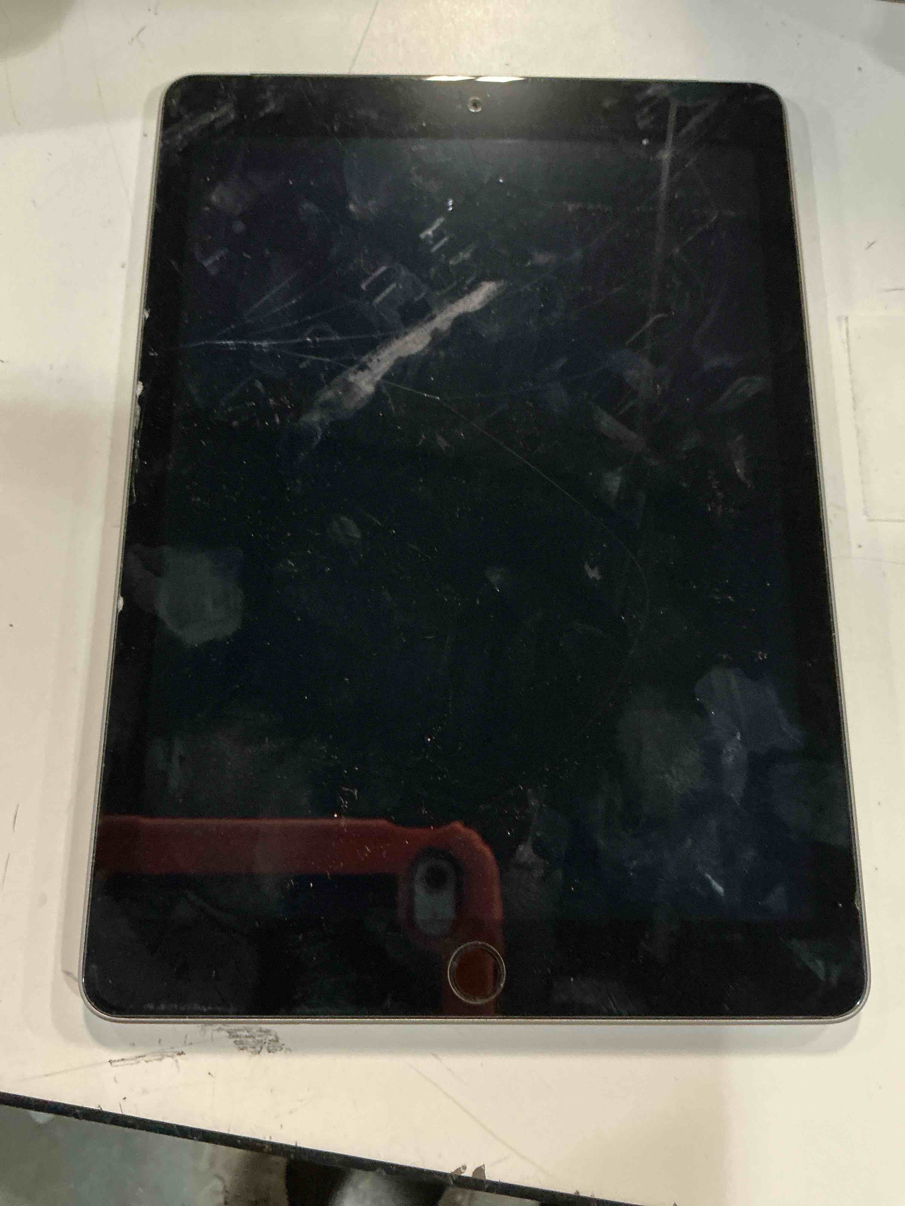 Condition photo showing Working Condition Verified for (without charge)Apple iPad 6th Generation A1822 128GB Wi-Fi 9.7in Space Gray
