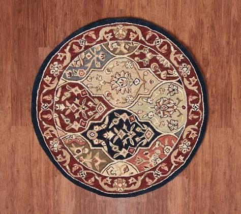 royal place 4’ round wool Kirman medallion rug
