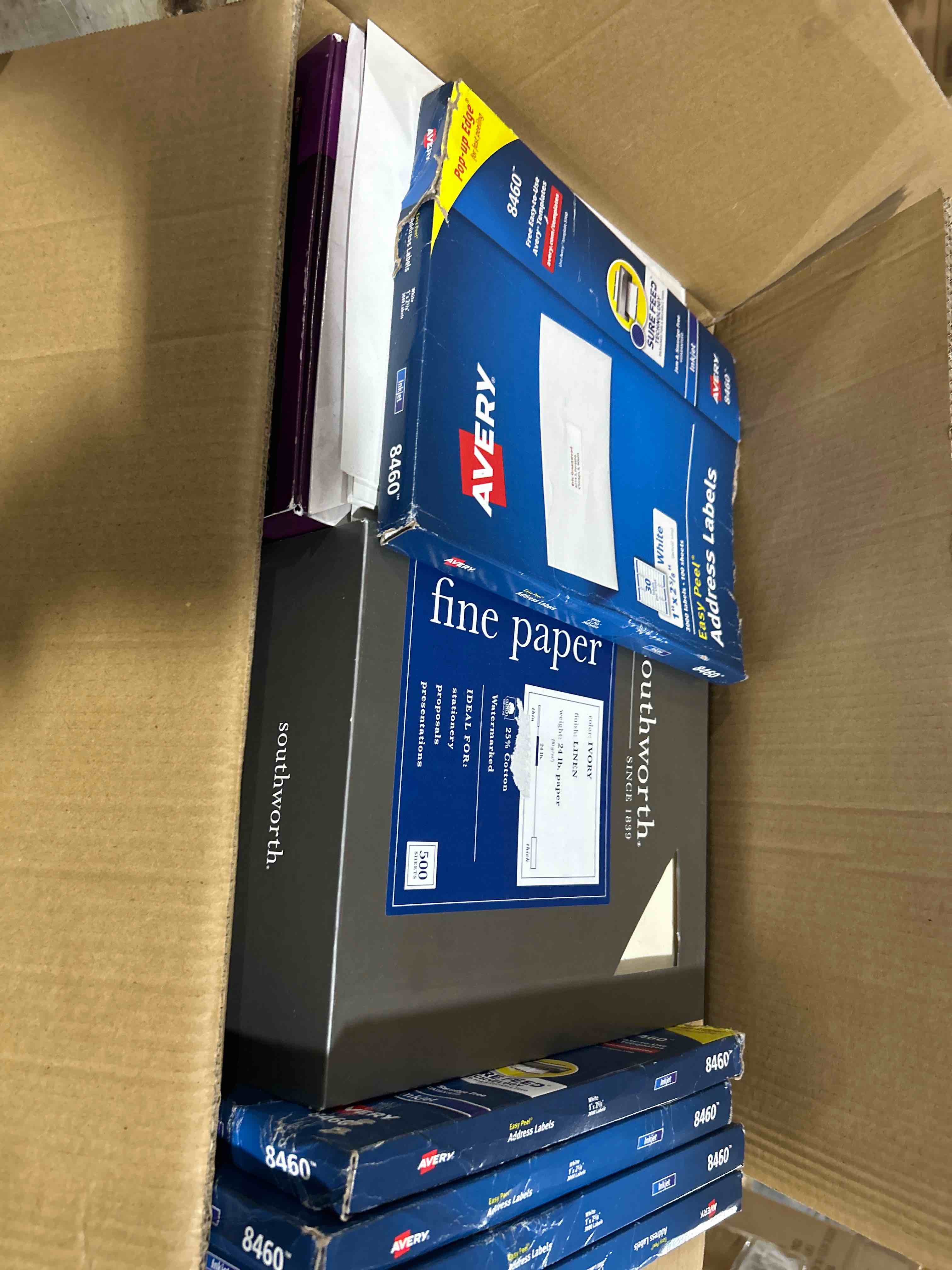 box of assorted office supplies ect…