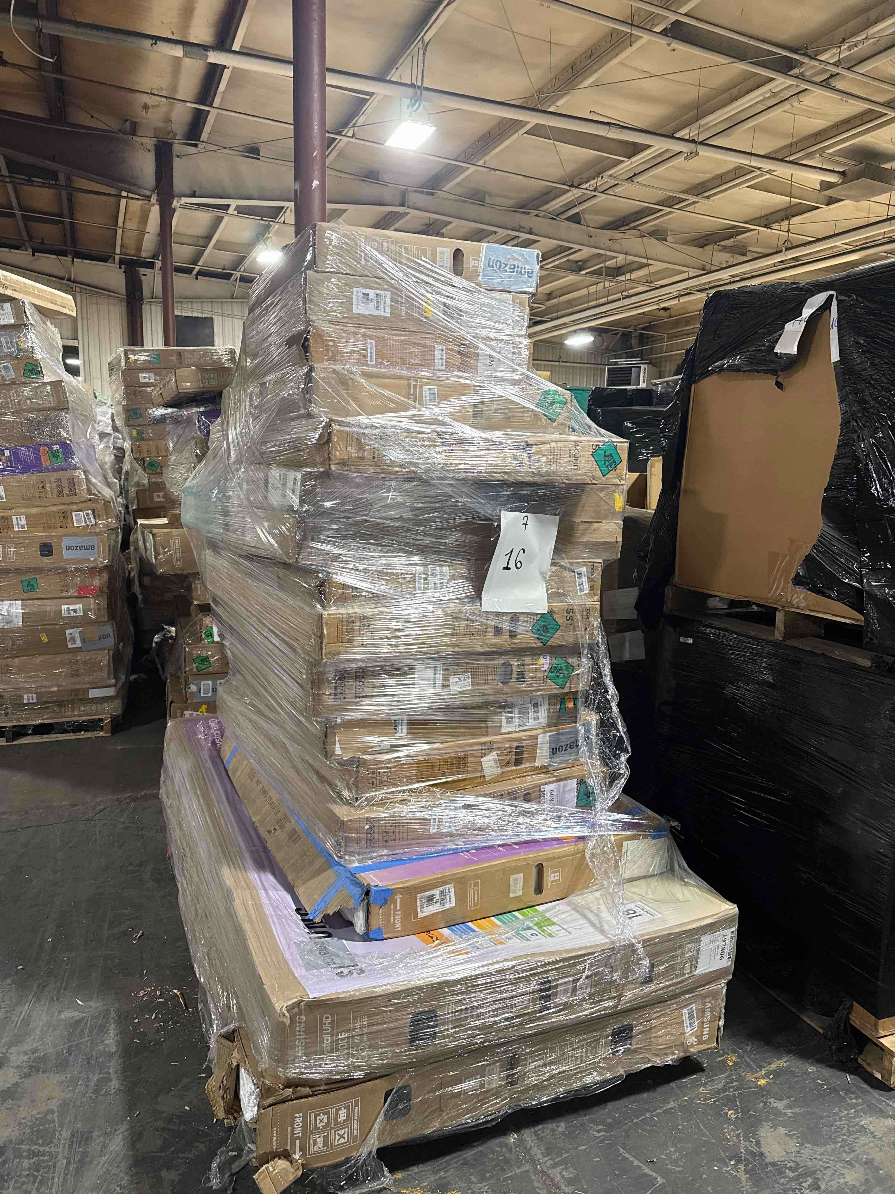 lot of 16 TVs most 55 inches or larger brands like LG, Samsung Vizio and Roku four parts or repair your bid per TV