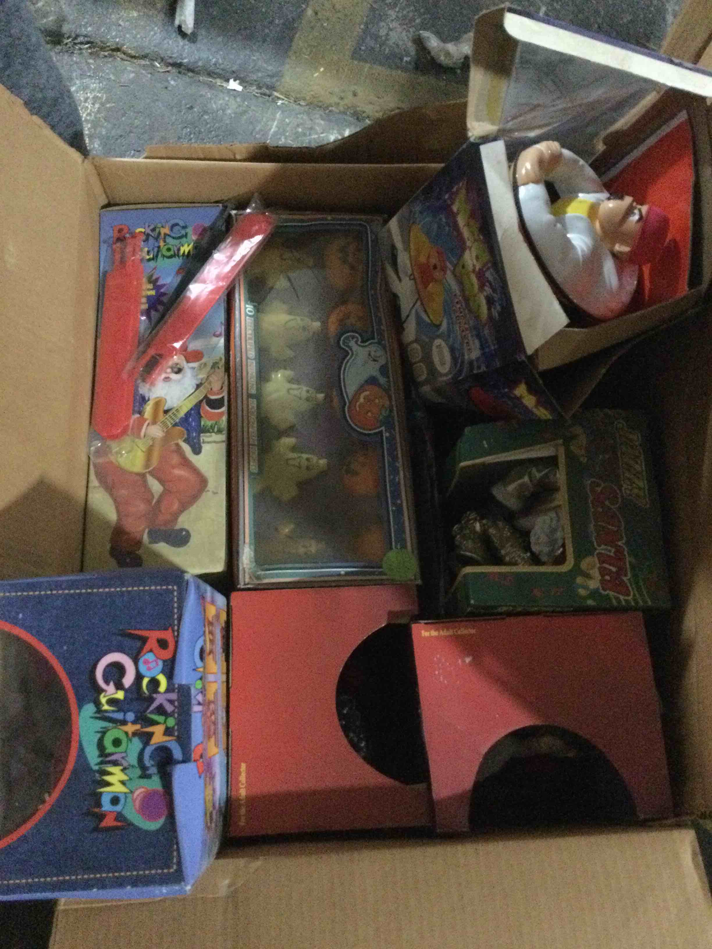 box of assorted toys ect…