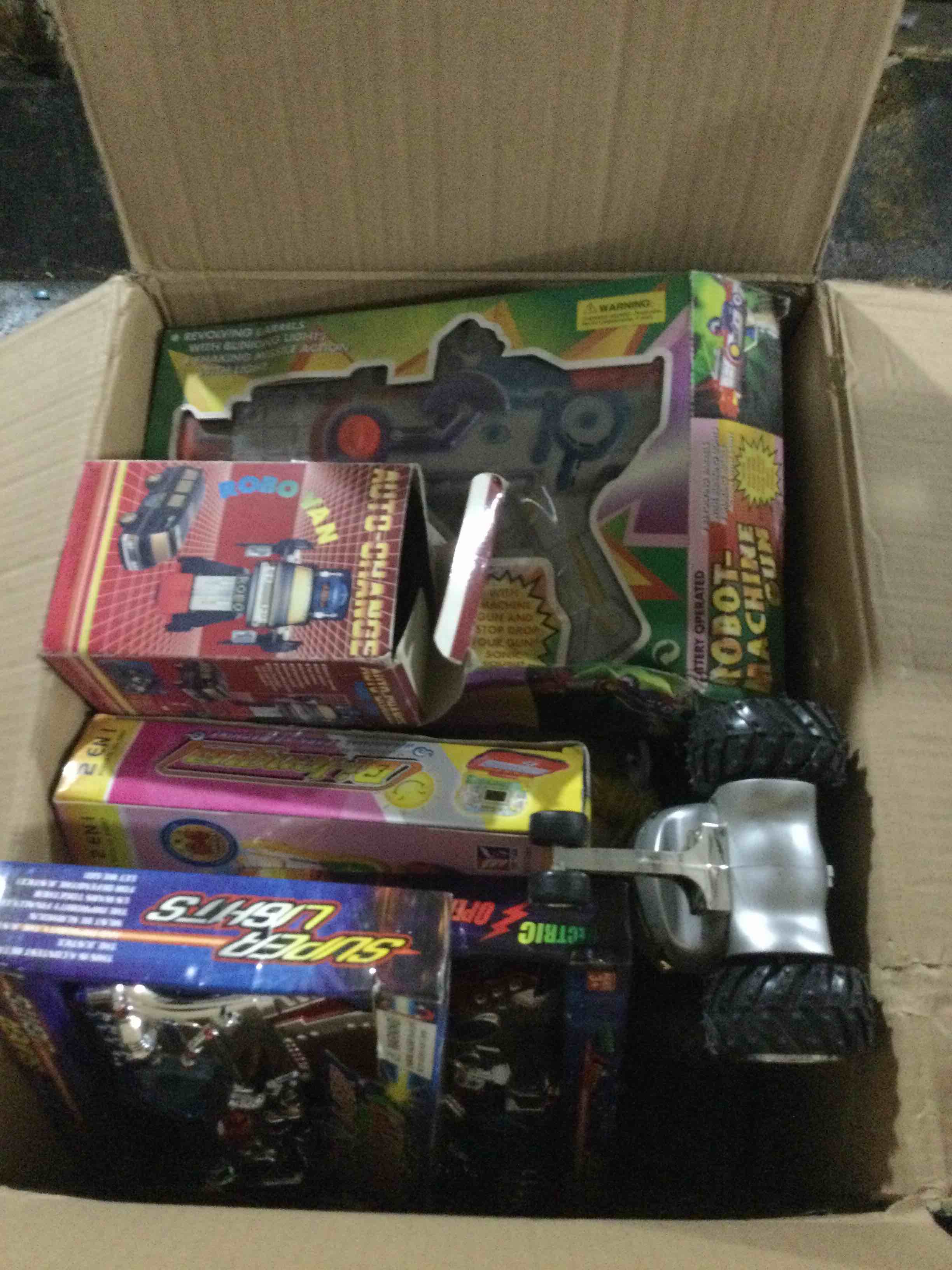 box of assorted toys ect…