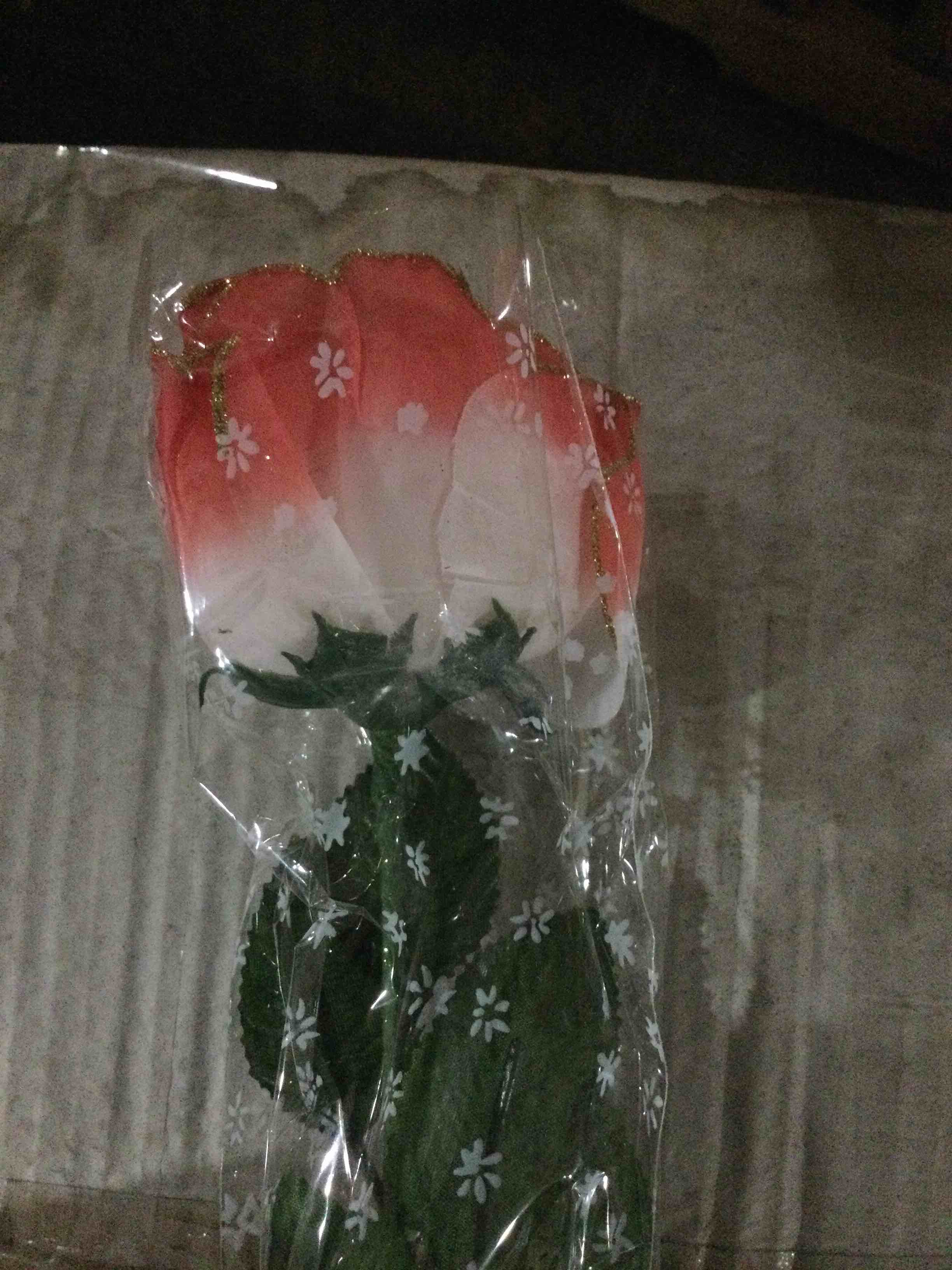 box of pink/white fake roses