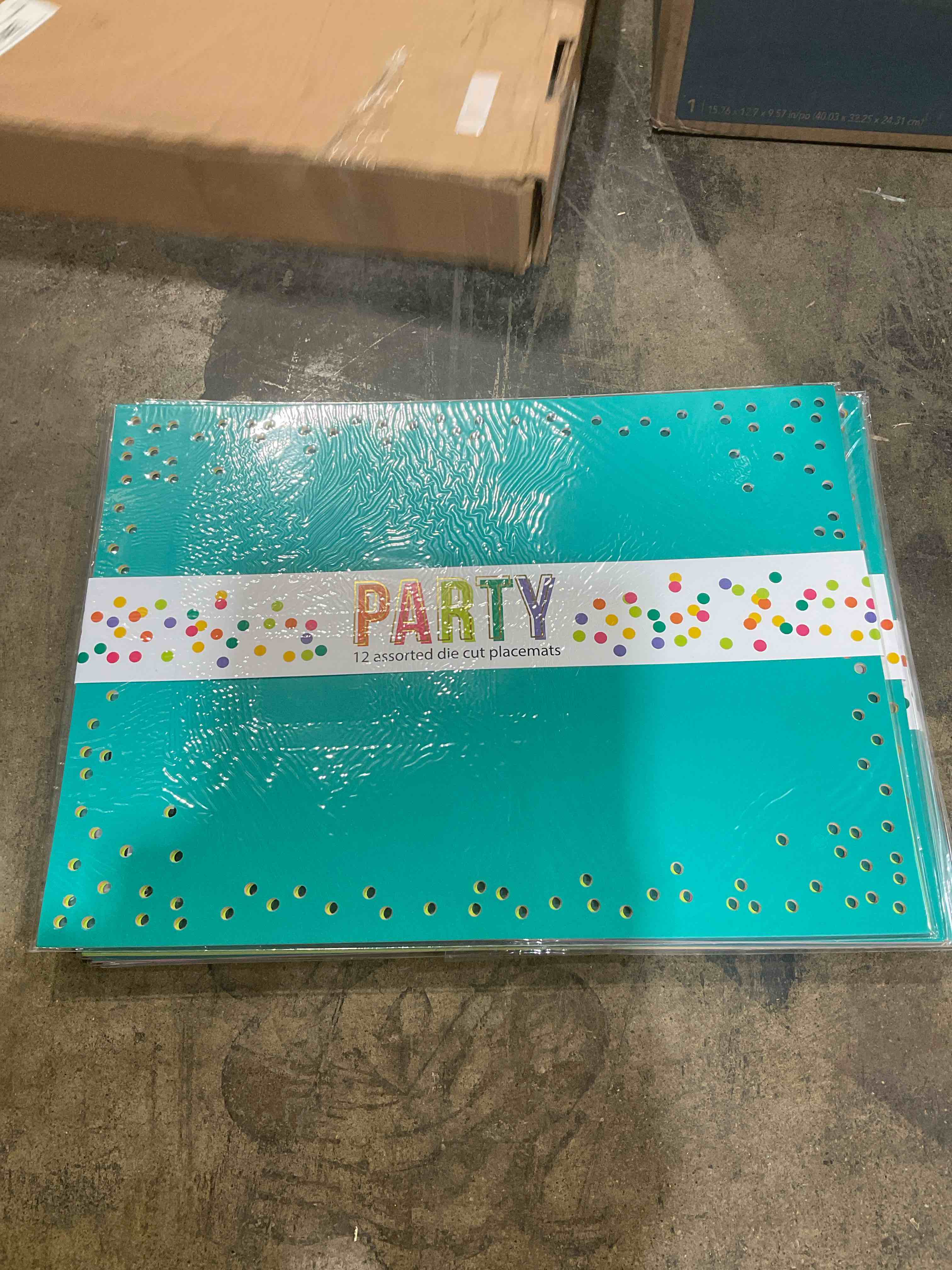 12 assorted die cut party placemats per bundle, 5 count