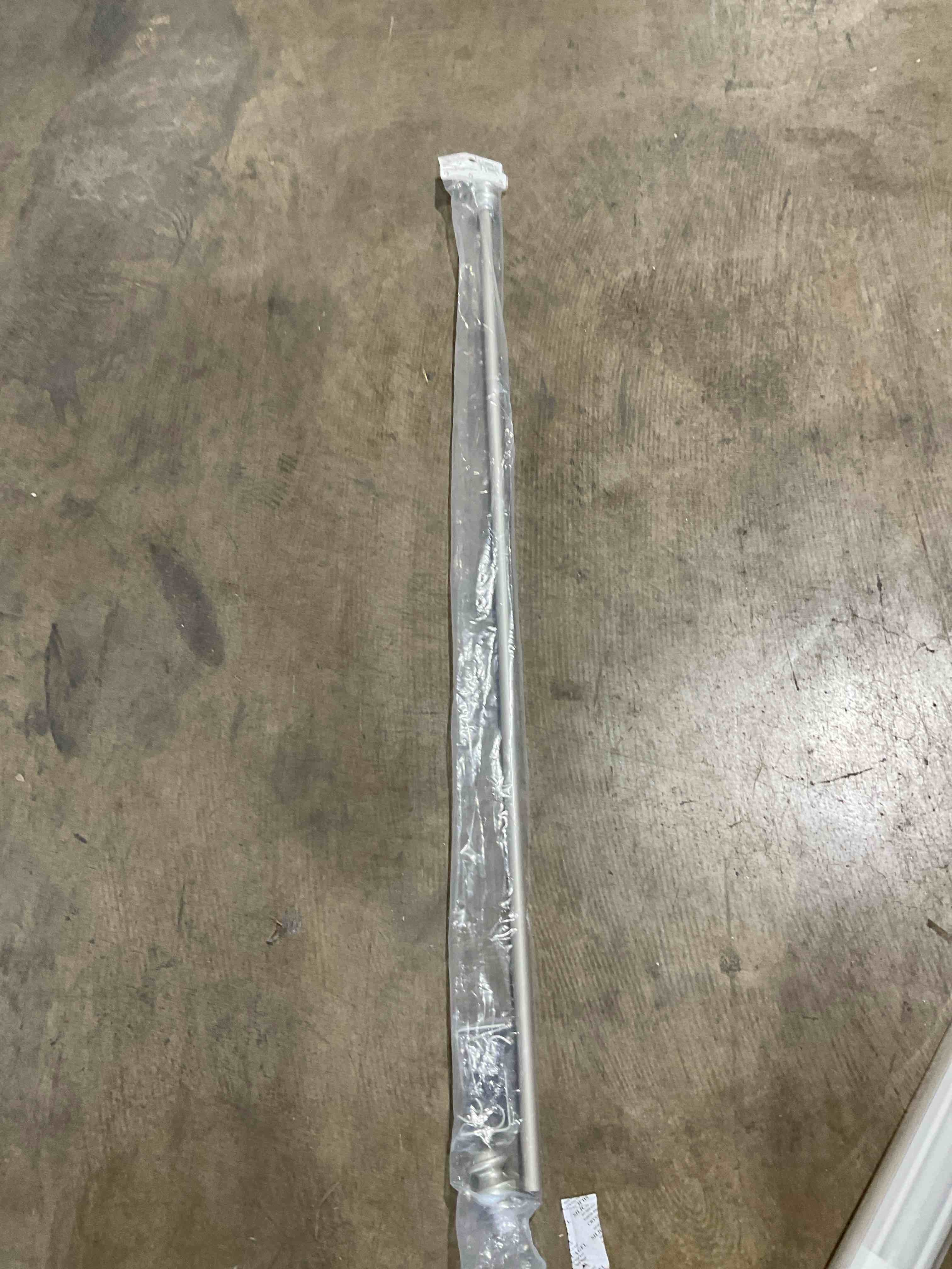 Condition photo showing New/Like New for kenney kendall knob window curtain rod, adjustable 48-86 inch, brushed nickel 48-86" brushed nickel