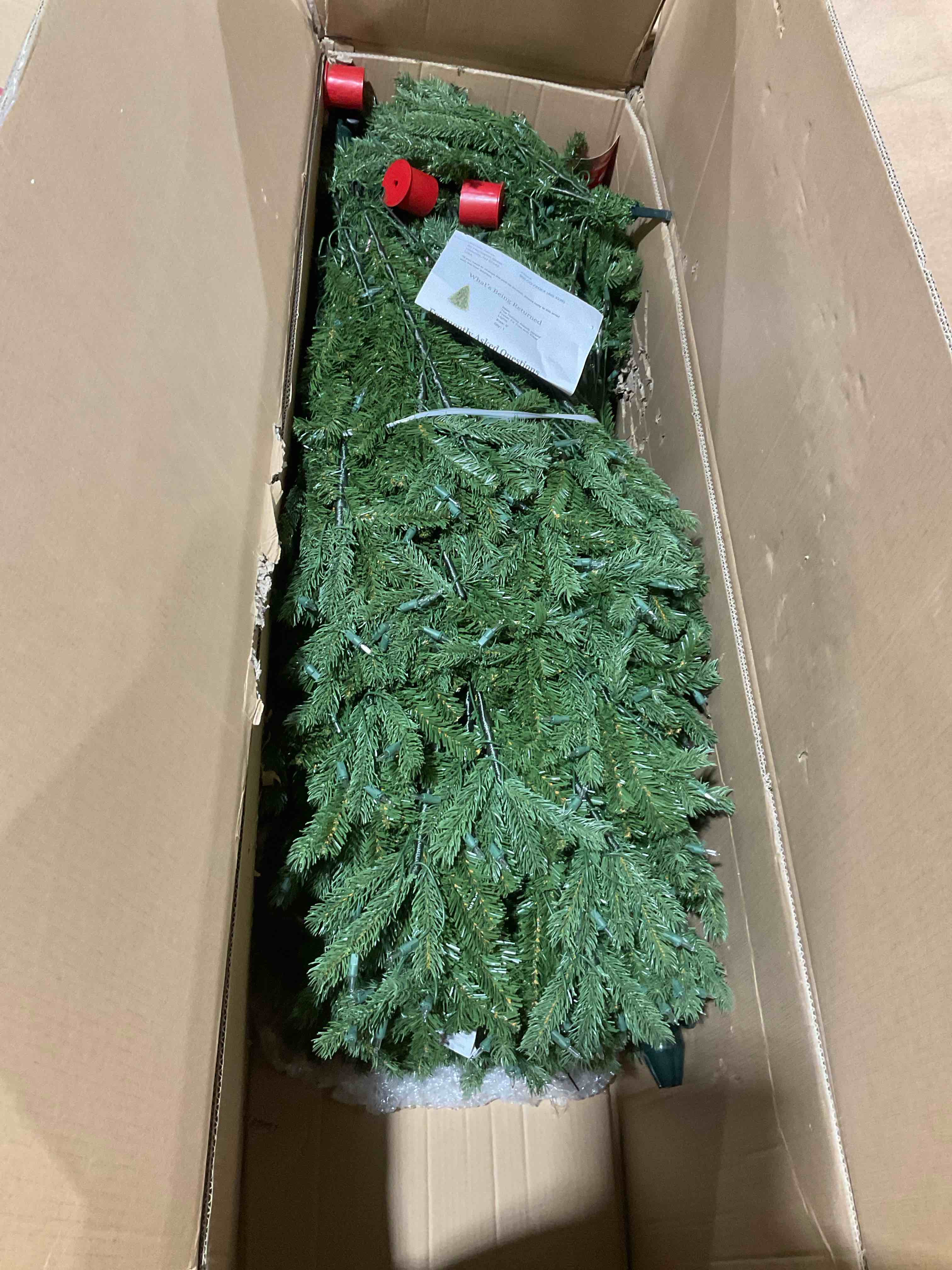 Condition photo showing New/Like New for national tree company 9 ft pre-lit jersey fraser fir artificial christmas tree, 1,500 clear lights, 4,804 tips, includes stand, green 9ft