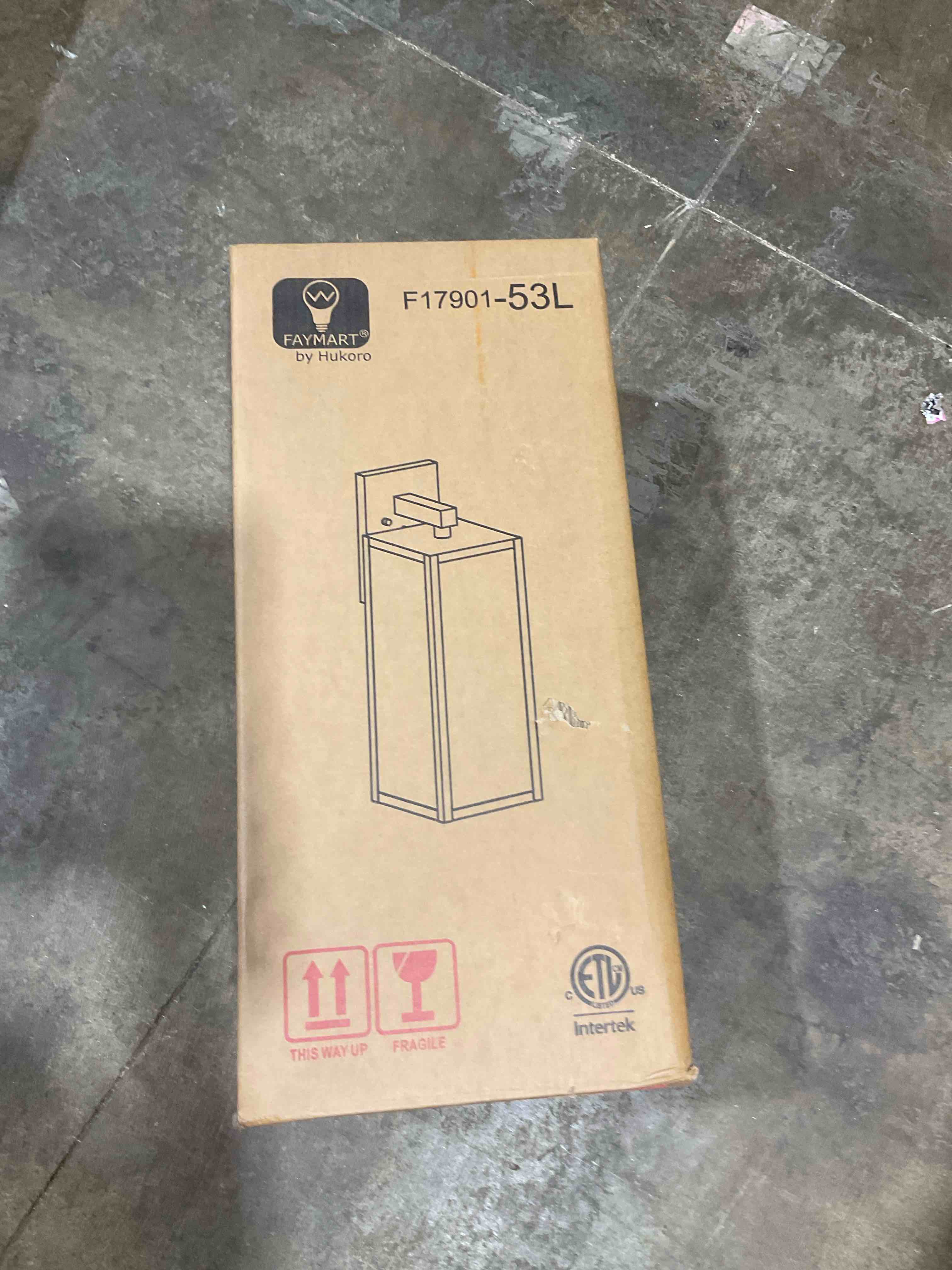 Condition photo showing New/Like New for globe electric 44176 1-light outdoor/indoor wall sconce, matte black finish, clear glass shade, weather-resistant modern exterior light