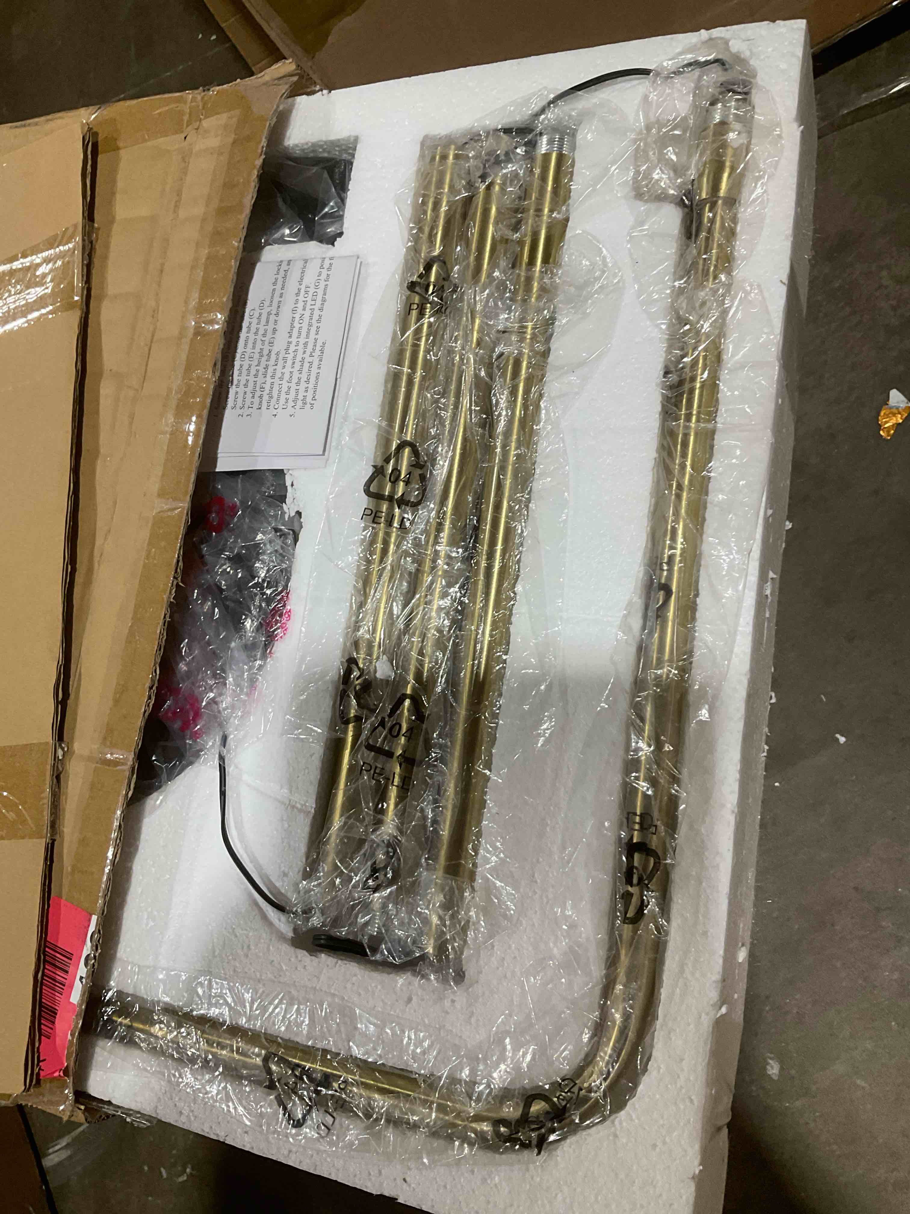 Condition photo showing New/Like New for verve brassed gold floor lamp with on/off switch adjustable led round base