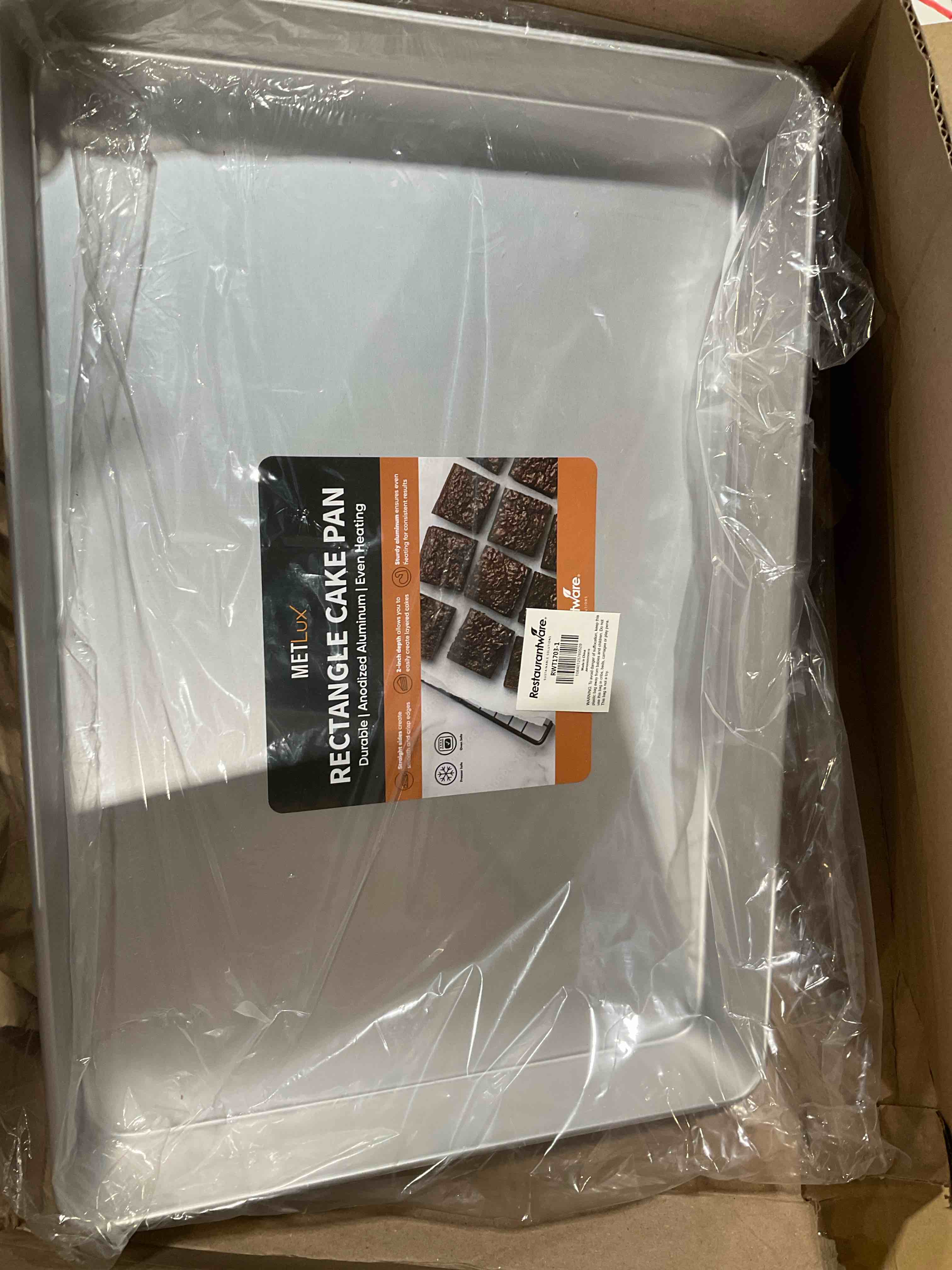 Condition photo showing New/Like New for wilton aluminum 9x13 inch rectangular sheet pan, made with natural anodized aluminum, made without pfas, bakeware optimal for even heating