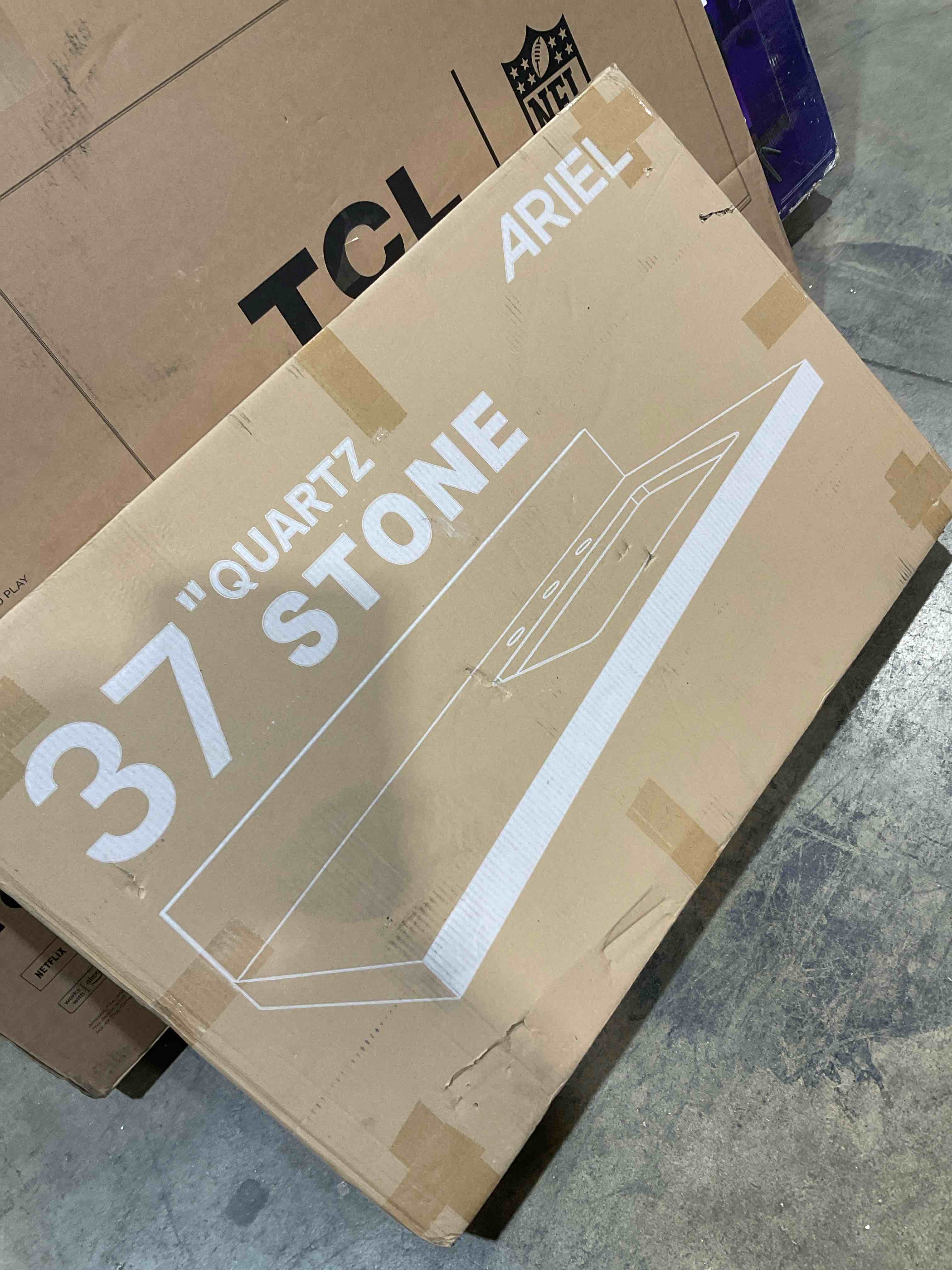 Condition photo showing New/Like New for ariel 37 inch bathroom vanity top with sink, 1.5 inch thick miter edge white quartz top, left offset vanity top with rectangle porcelain sink, includes backsplash