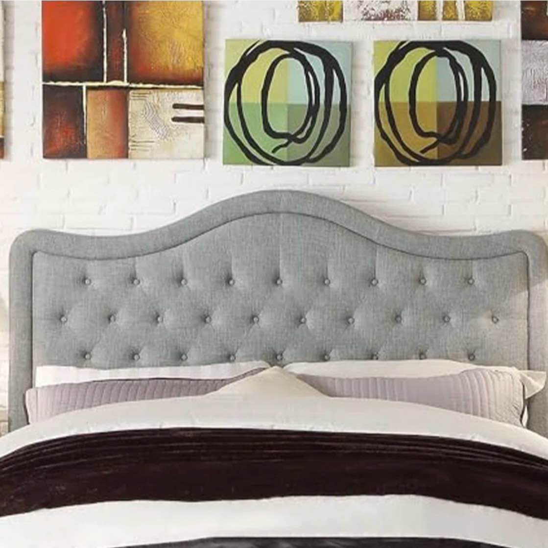 adjustable headboard with fine linen upholstery and button tufting fo