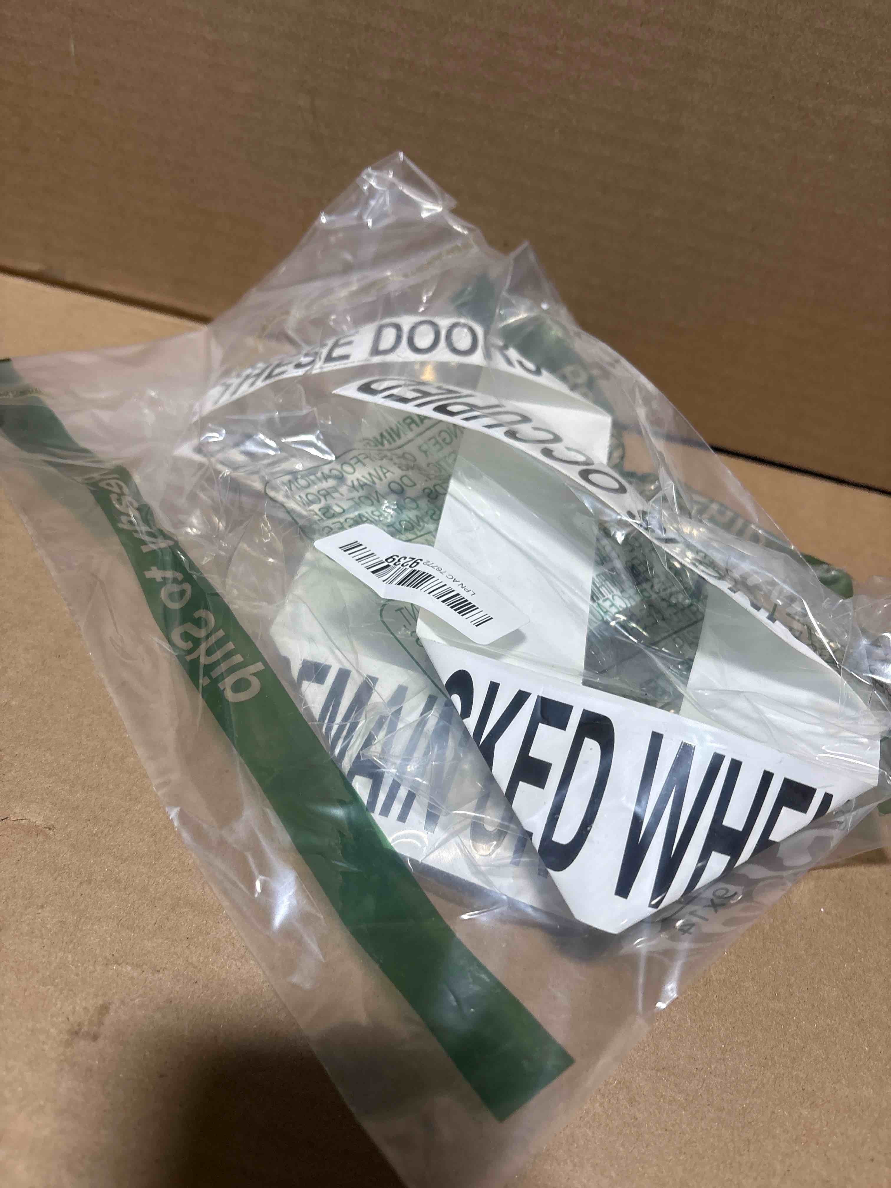 Condition photo showing New/Like New for ComplianceSigns.com These Doors To Remain Unlocked When Building Is Occupied Safety Label Decal, 24x2 inch Vinyl for Dining/Hospitality/Retail