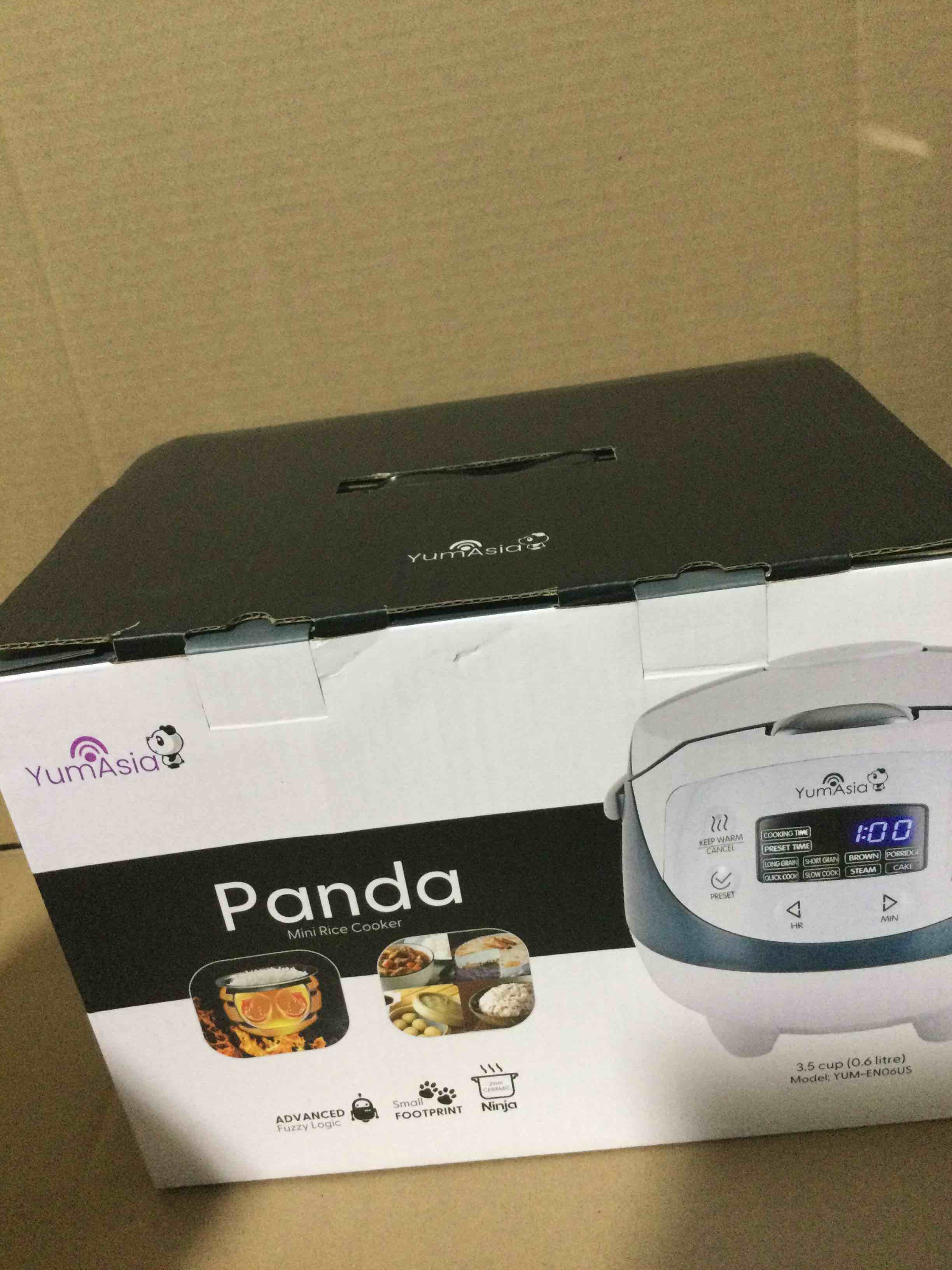 Condition photo showing item condition for Yum Asia Panda Mini Rice Cooker With Ninja Ceramic Bowl and Advanced Fuzzy Logic (3.5 cup, 0.63 litre) 4 Rice Cooking Functions, 4 Multicooker functions, Digital LED display - 120V White and Grey
