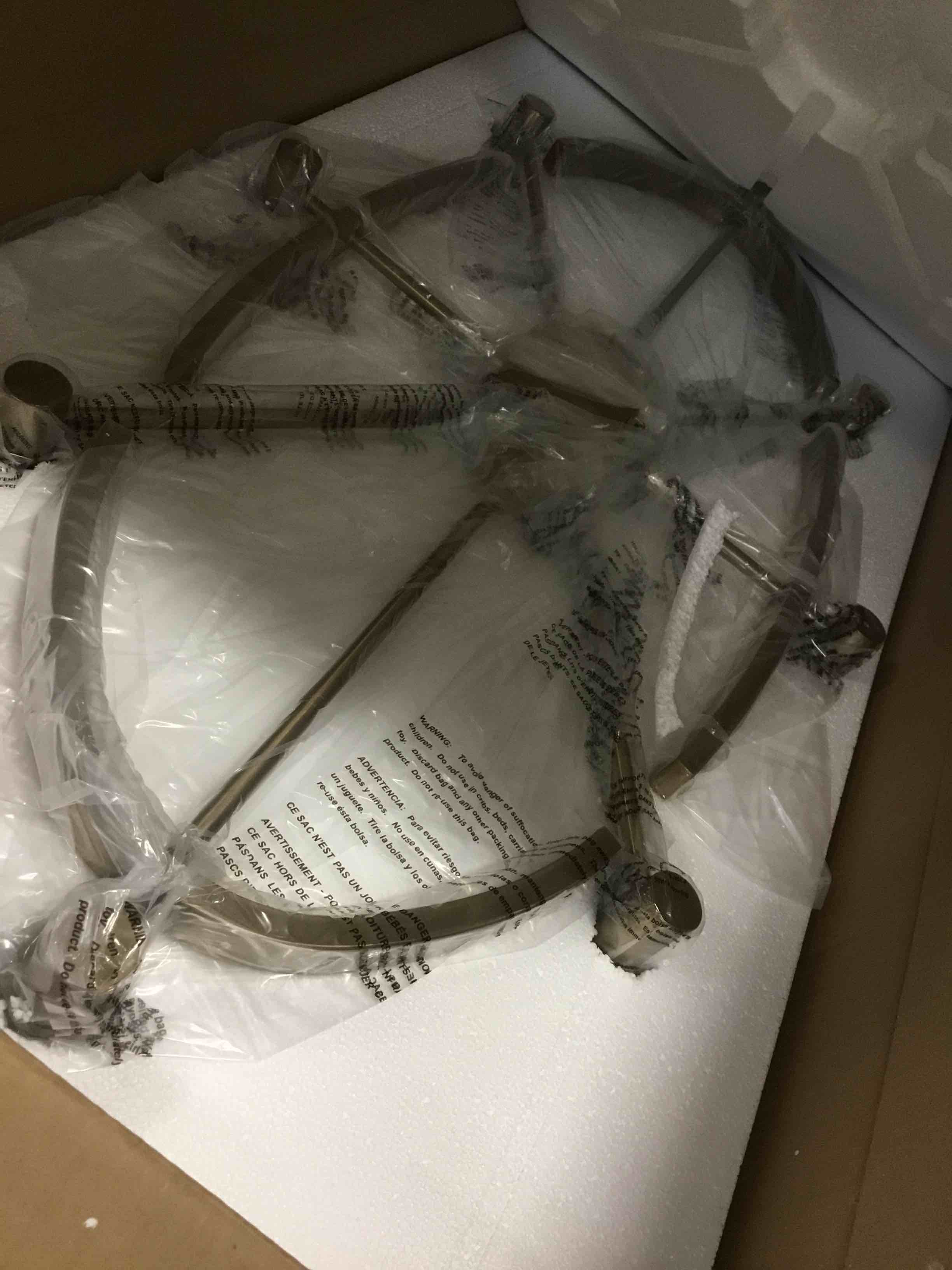 Condition photo showing New/Like New for kichler 52429 tolani 8 light 43 wide taper candle chandelier - brushed natural brass