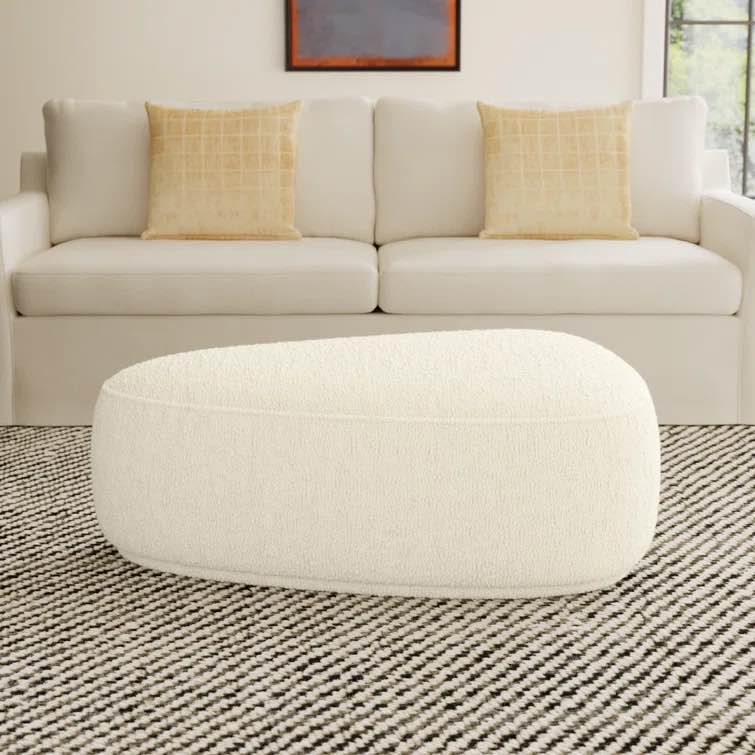 adna 44” triangular upholstered ottoman 