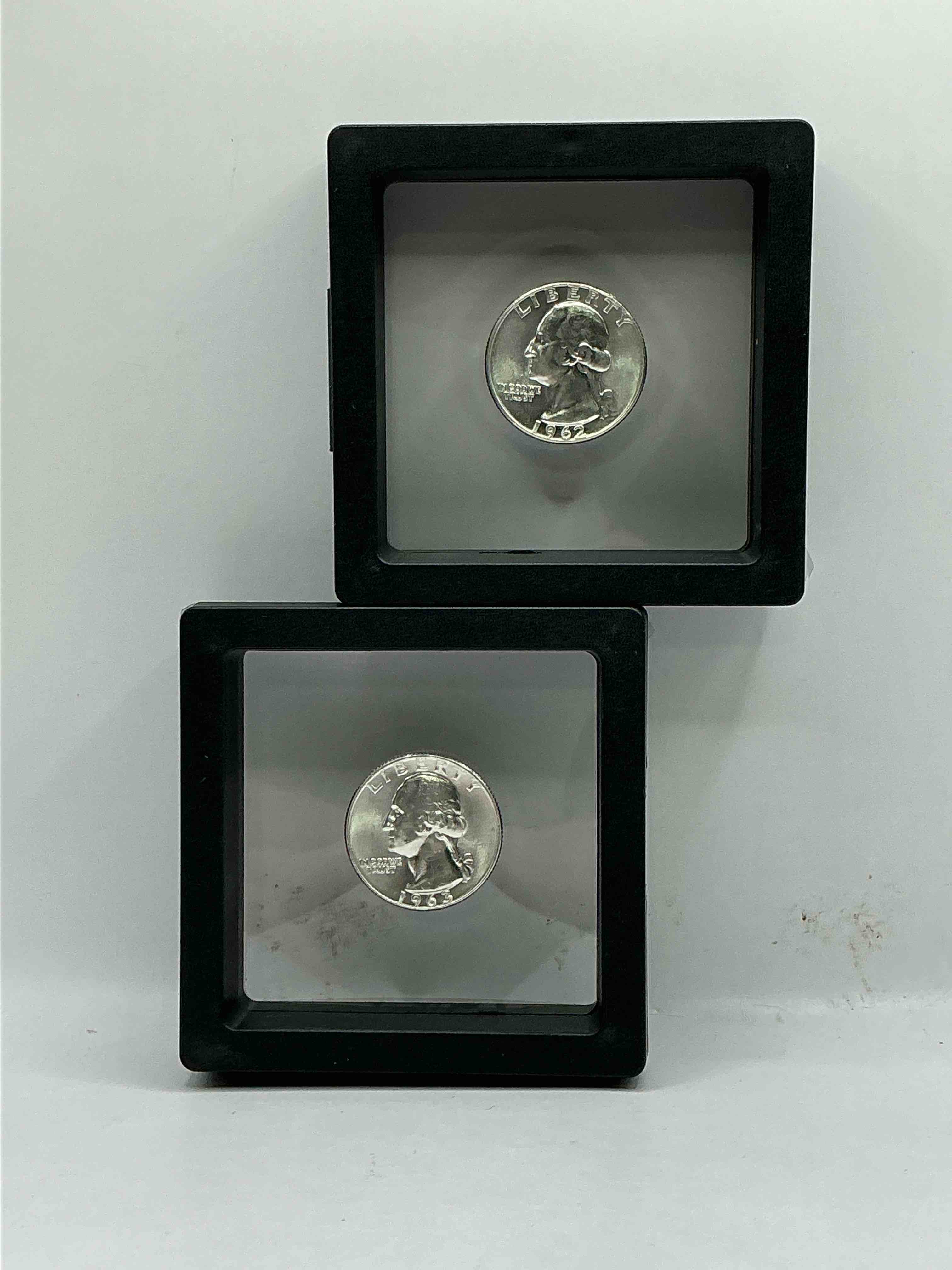 George Washington Brilliant Uncirculated Silver! Pre 1965 U.S. Quarter Dollar Coins Were Actually Silver, Here Are two Great Examples Of Awesome, Pristine George Washington Silver Quarters, Stunning & Uncirculated! Rare 1961 & 1959 Mints! Great For Investing In Precious Metals! These Coins Were Minted At 90% Silver and 10% Copper, Giving Them A Net Weight Of .18084 Ounces Of Pure Silver Per Coin! Very Hard To Find Uncirculated, Stunning! Invest In Fine U.S. Silver!