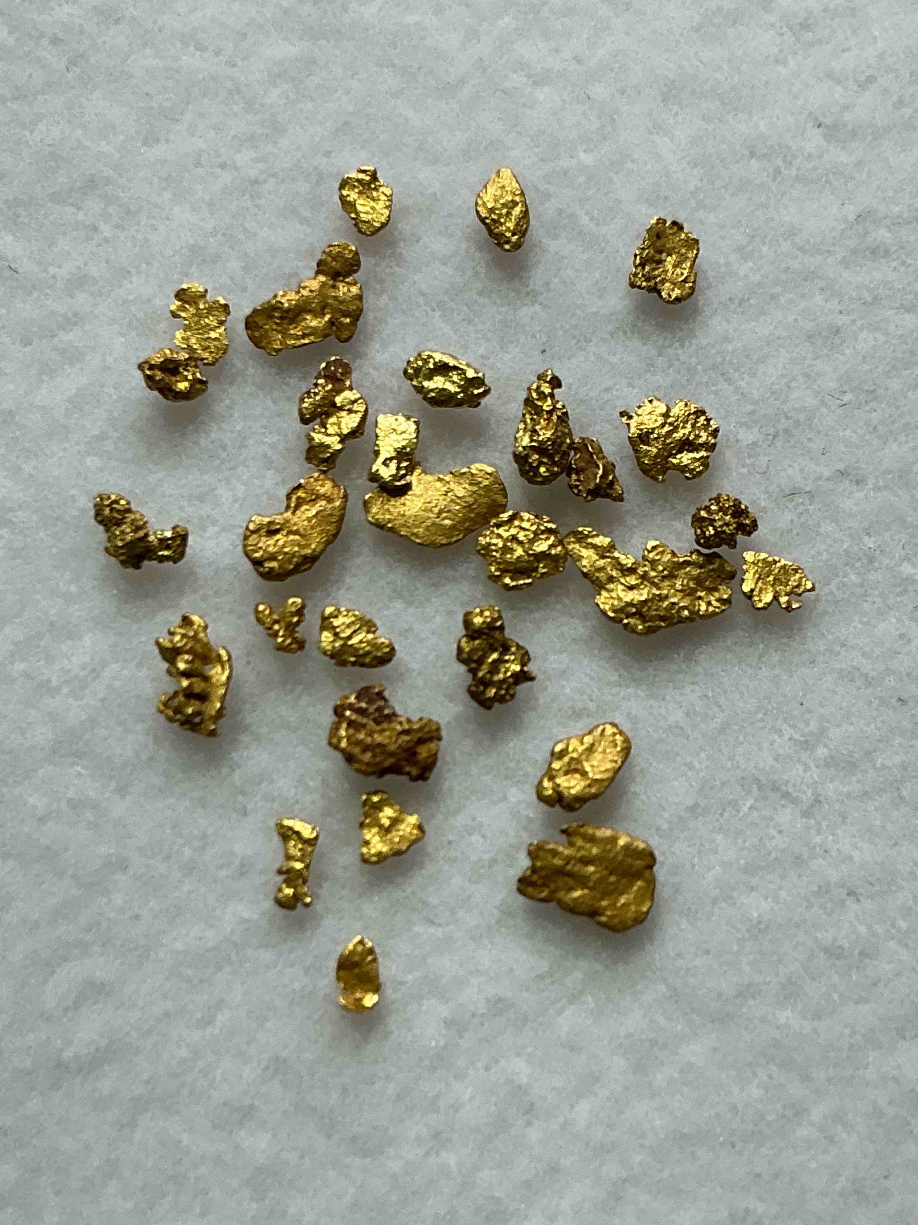 Genuine Gold Nuggets! Gold Nuggets Fresh From Prospecting North Carolina Mountains, Total Weight Of All Nuggets Is Approximately .5 Grams. These Gold Nuggets Typically Test At Between Approx 22-24 Karat. Gold In Raw, Prospected Form Is Extremely Hard To Find & Much Rarer Than Any Refined Form. Get In On The Gold Craze... Gold Has Increased In Value Over 40% In 2025 Alone! U.S. Dime For Size Reference Only (not included). Gold Vile In Image Included. Own Genuine, Gold Nuggets! 
