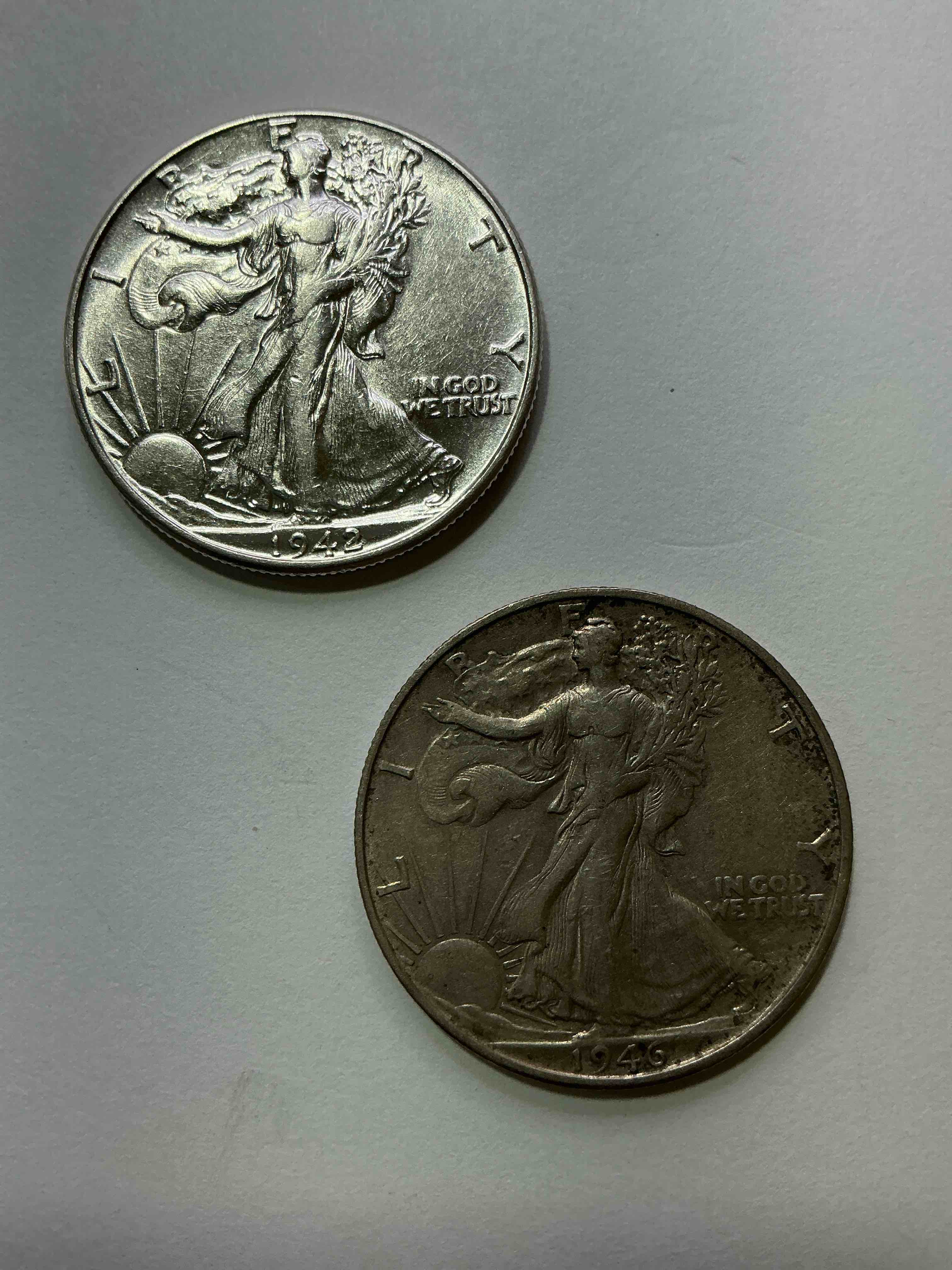 World War II Silver! Antique U.S. Silver! Liberty Walking Silver Fine U.S. Silver Half Dollar! This Striking Half Dollars Were Minted From 1916-1947 & Have Become Some Of The Most Collectible Coins In History! Here Is A Striking Circulated Example From 1942 & 1946! Appears Uncirculated! Liberty Walking Coins Are 90% Fine U.S. Silver, A Great Investment In Precious Metal!