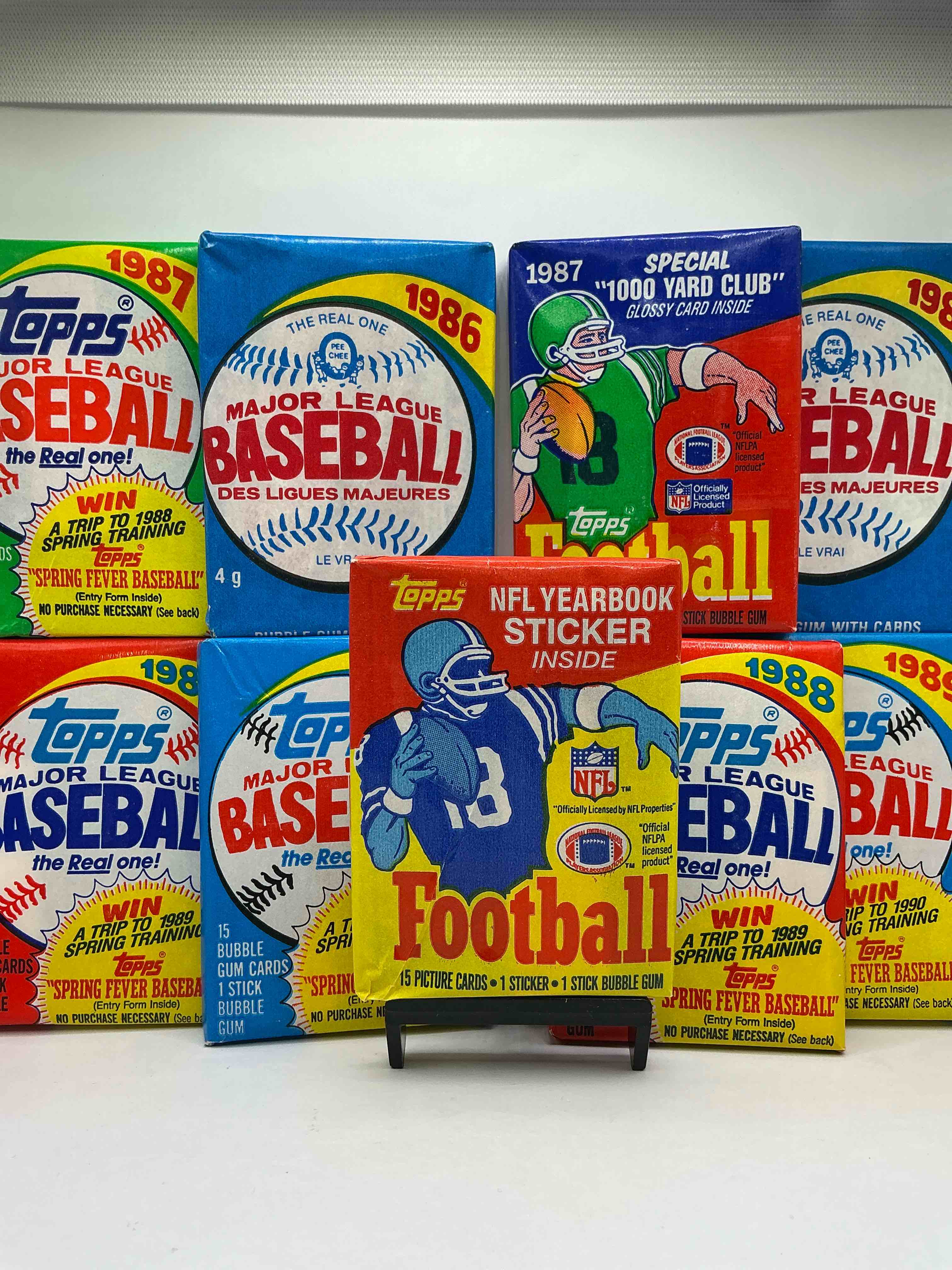 80’s Sports Fans! Ultimate Christmas Gift! Elite & Rare Football & Baseball Packs From The 1980’s Unopened & Sealed, All Packs True “Wax Packs.” Lot Includes Elite & Rare 1985 & 1987 Topps Football, 1986 O-Pee-Chee Baseball & More! 
