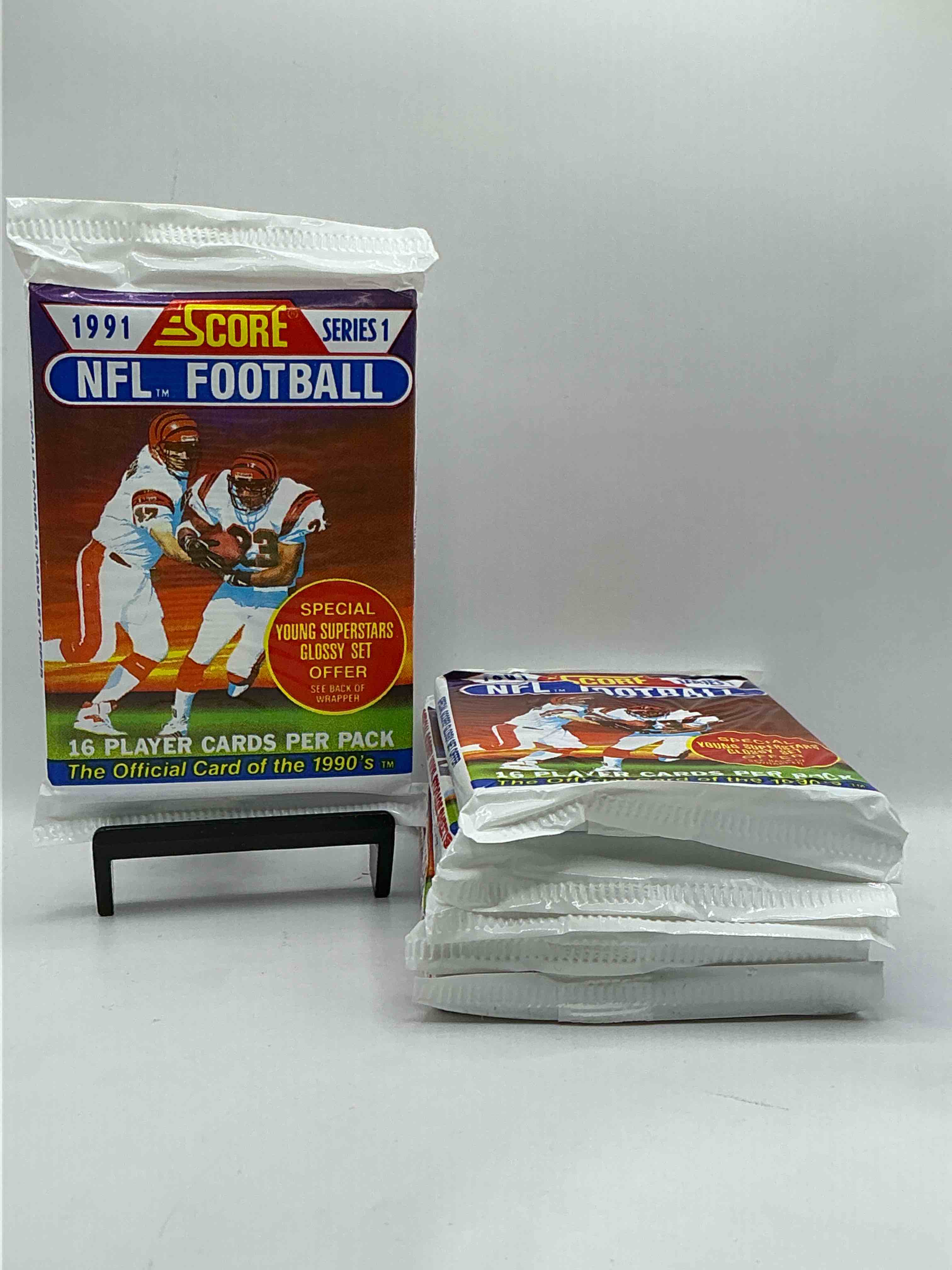 1991 NFL Score Football Sealed Card Pack, Direct From Original Retail Case! These Cards Are Sought After By Collectors For Their Awesome, Nostalgic Look. Search For Brett Favre Rookie, Early Jerry Rice, Early Emmit Smith, Joe Montana & So Much More!